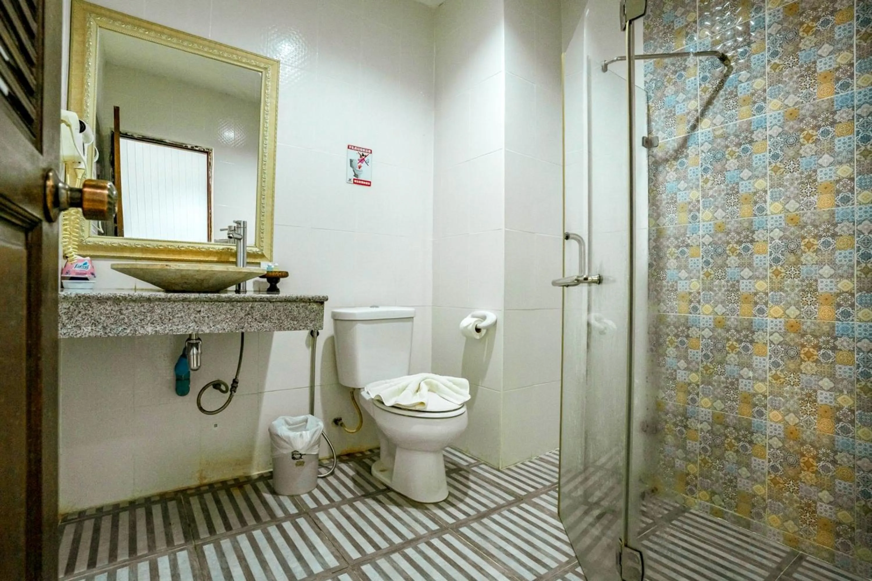 Toilet in Kasalong Resort and Spa Pattaya