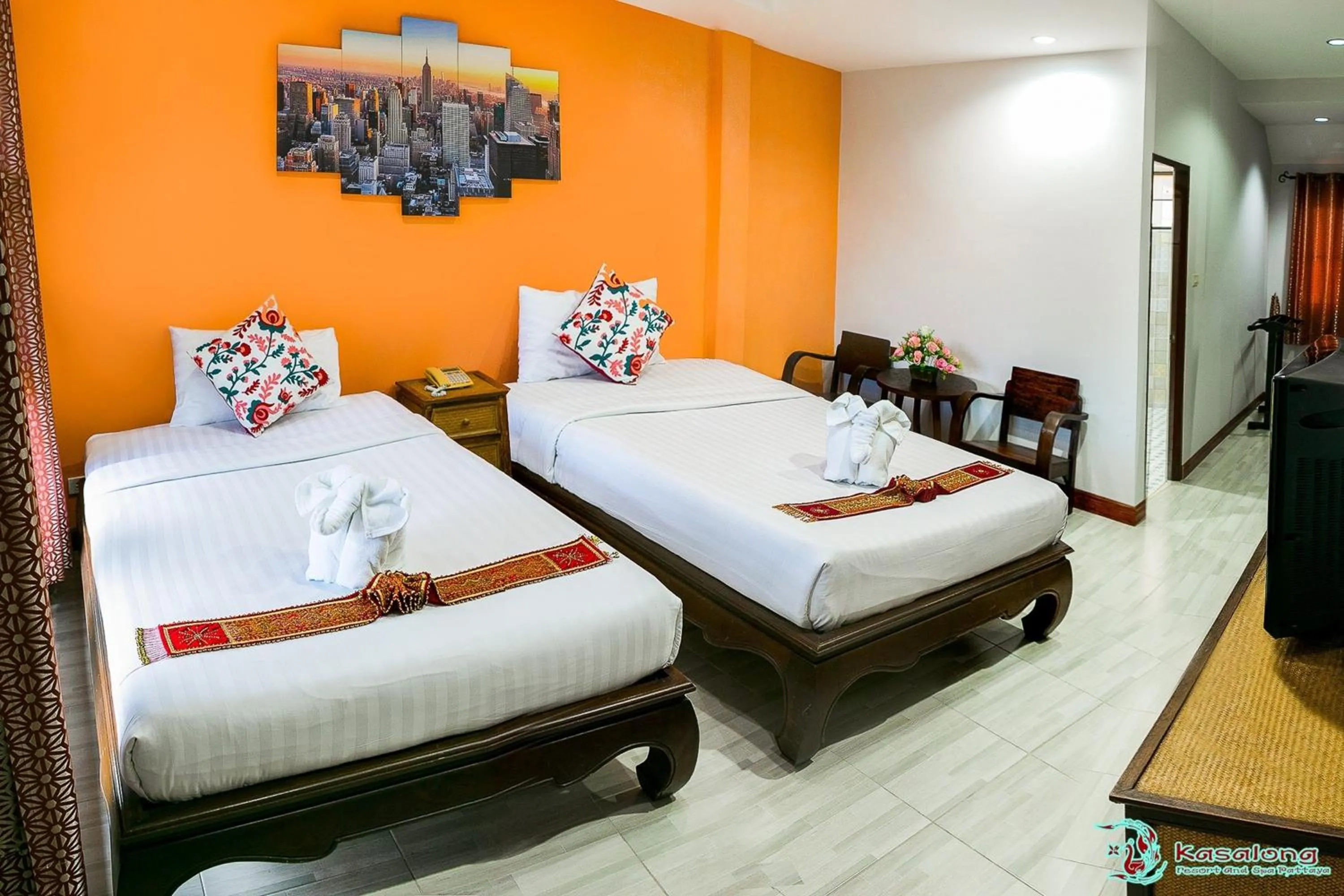 Bed in Kasalong Resort and Spa Pattaya