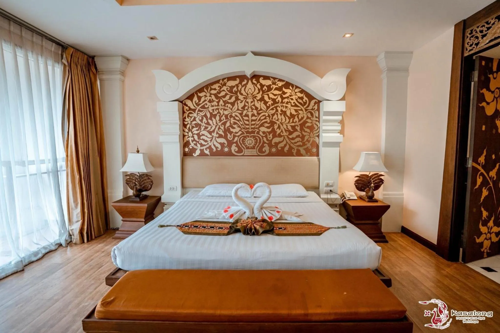 Bed in Kasalong Resort and Spa Pattaya