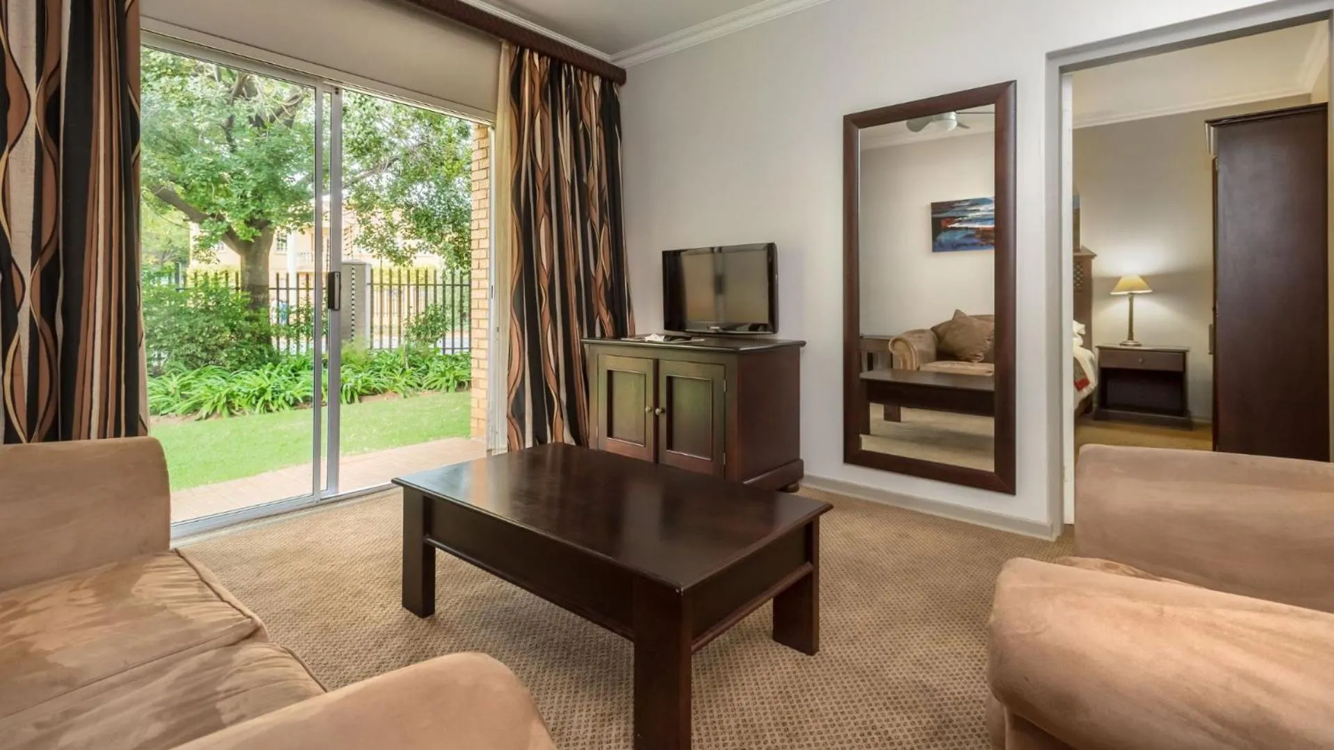 Communal lounge/ TV room in ANEW Hotel Witbank Emalahleni