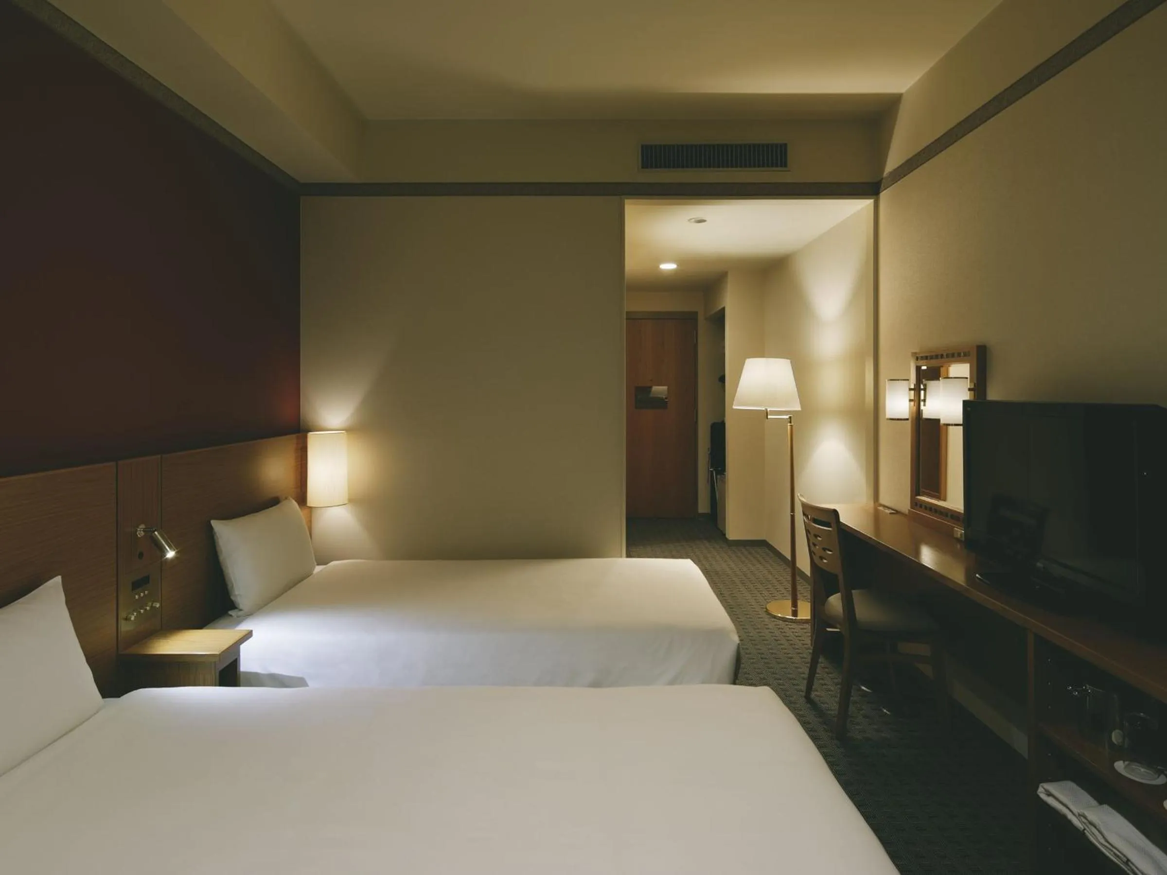 Bed in The Mark Grand Hotel