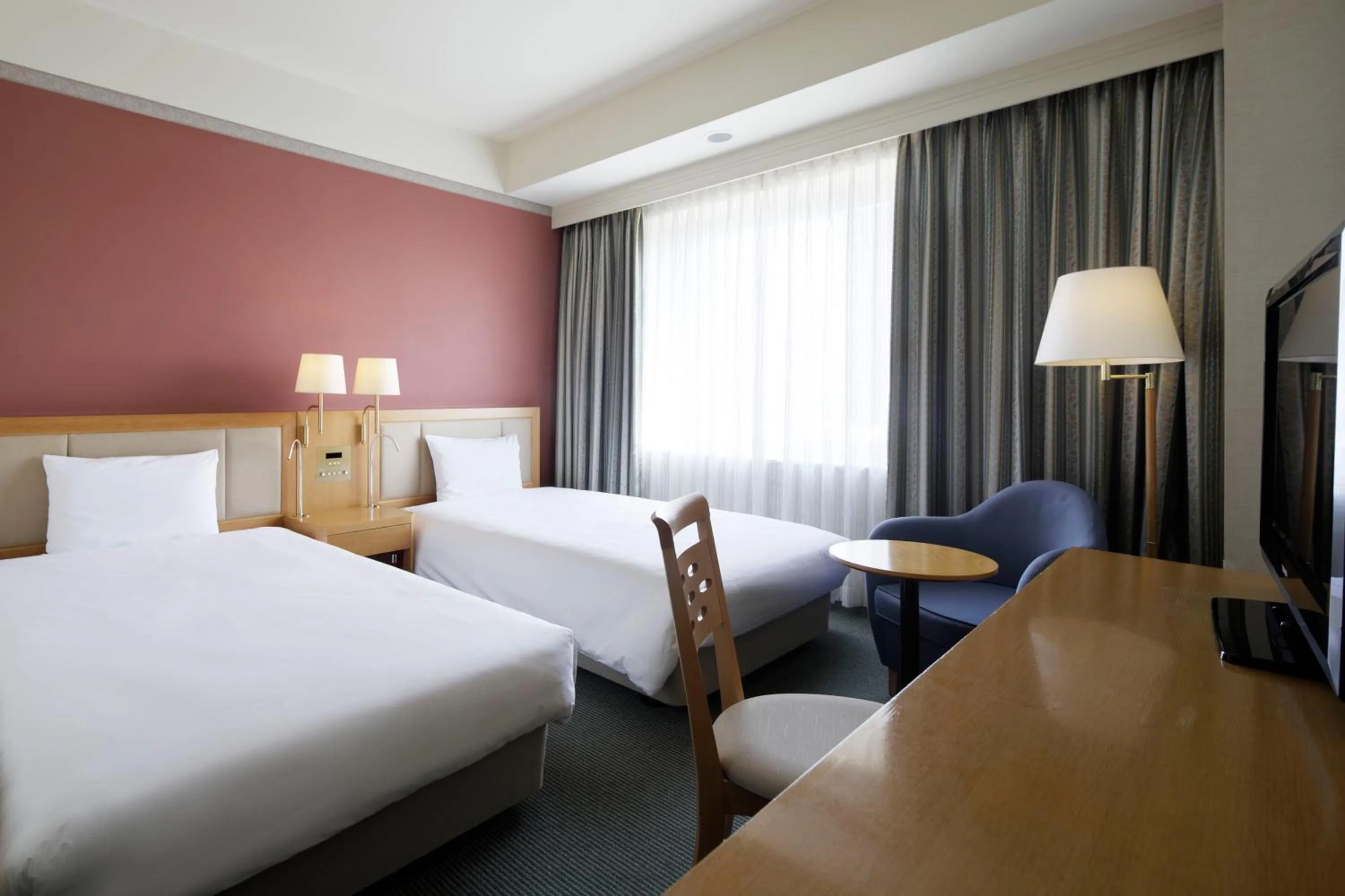 Bed in The Mark Grand Hotel