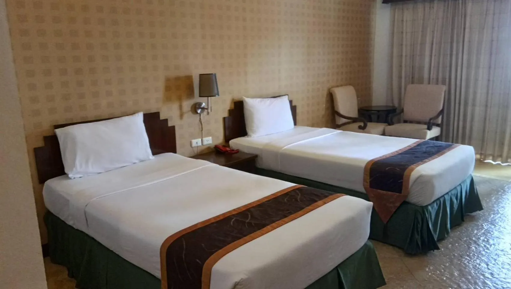 Bed in Golden Pine Beach Resort