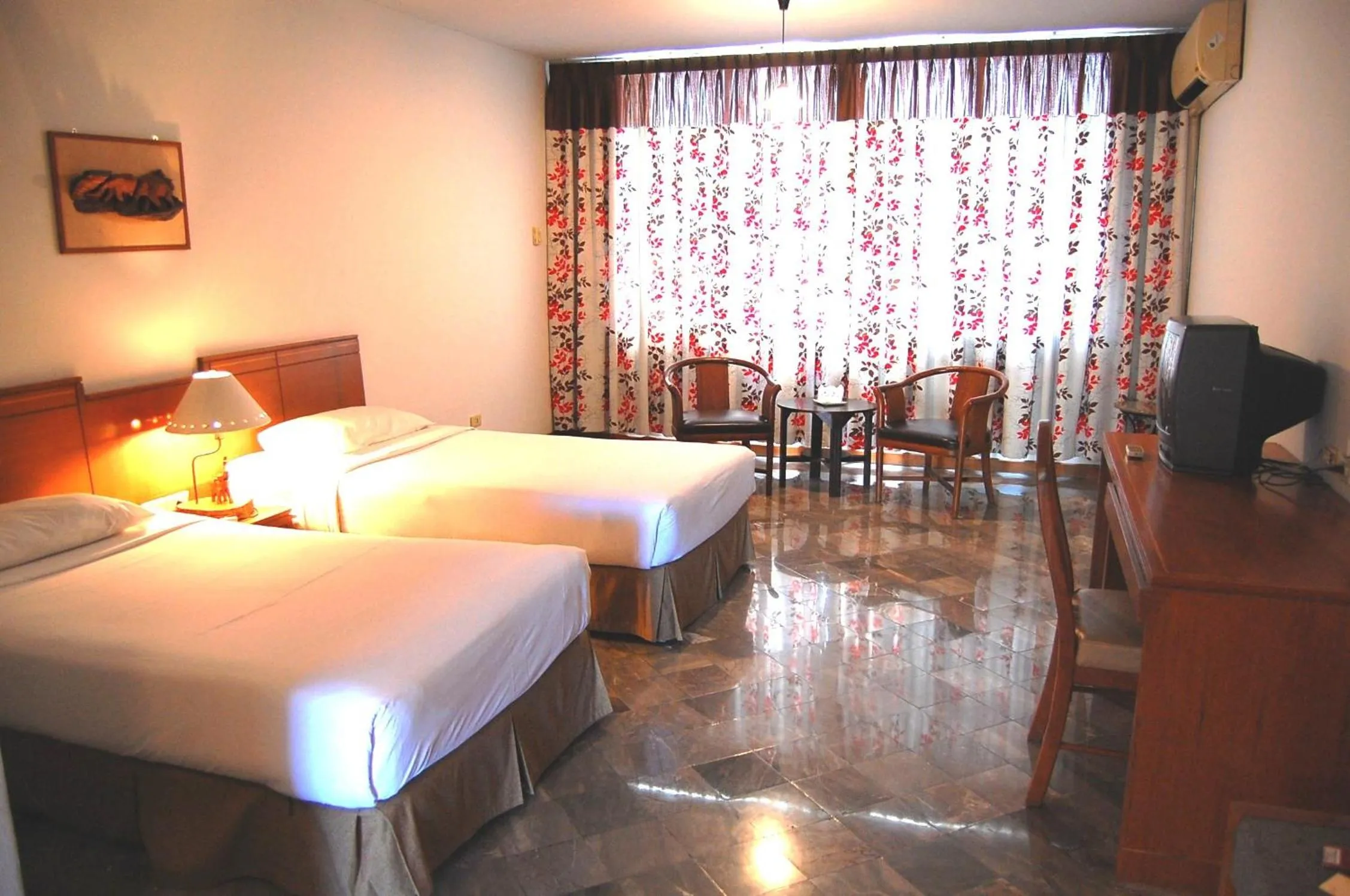 Bed in Royal Lanna Hotel