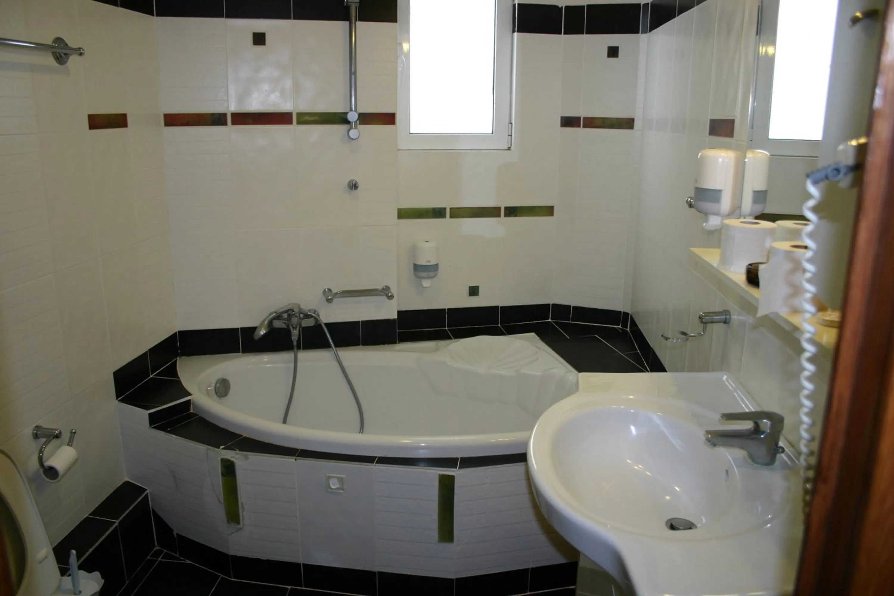 Bathroom in Petit Palais Hotel