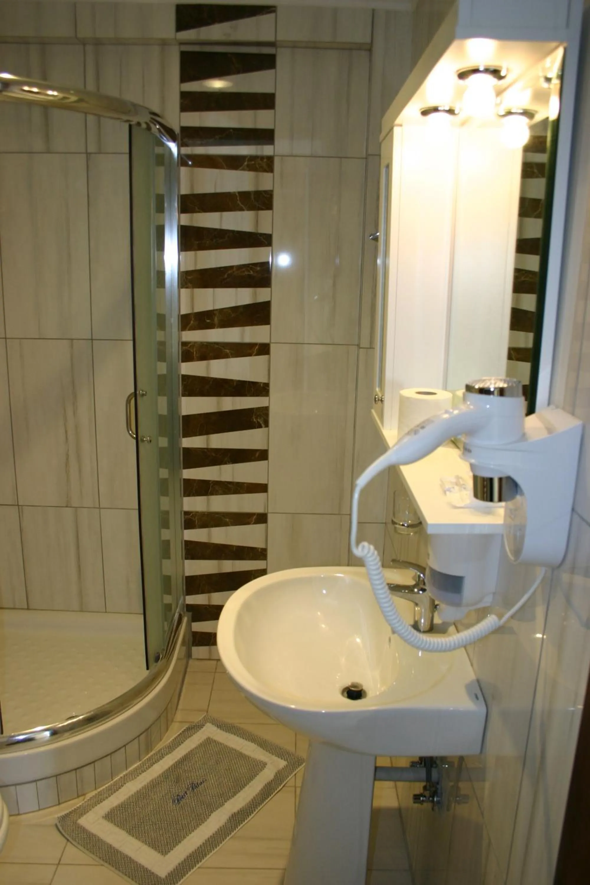Bathroom in Petit Palais Hotel