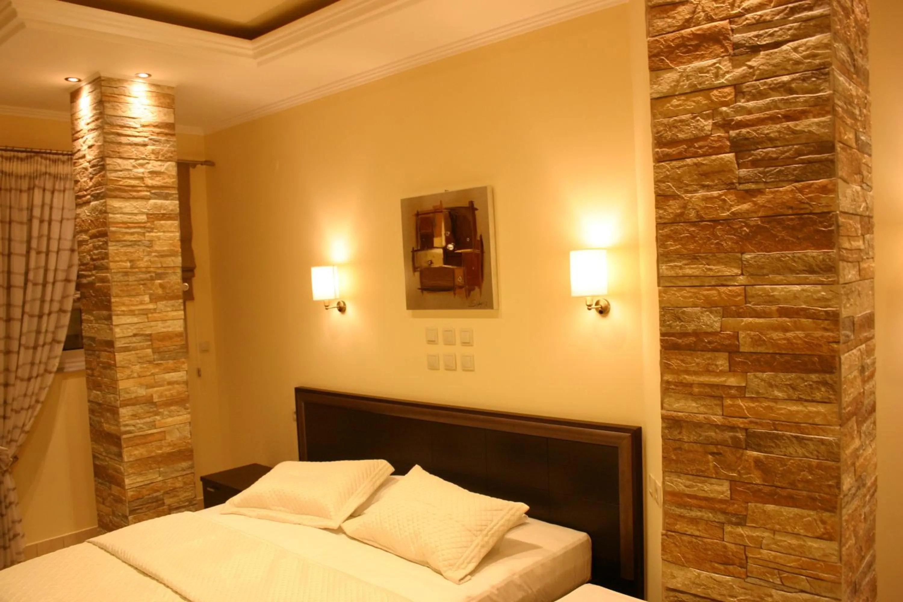 Bed in Petit Palais Hotel