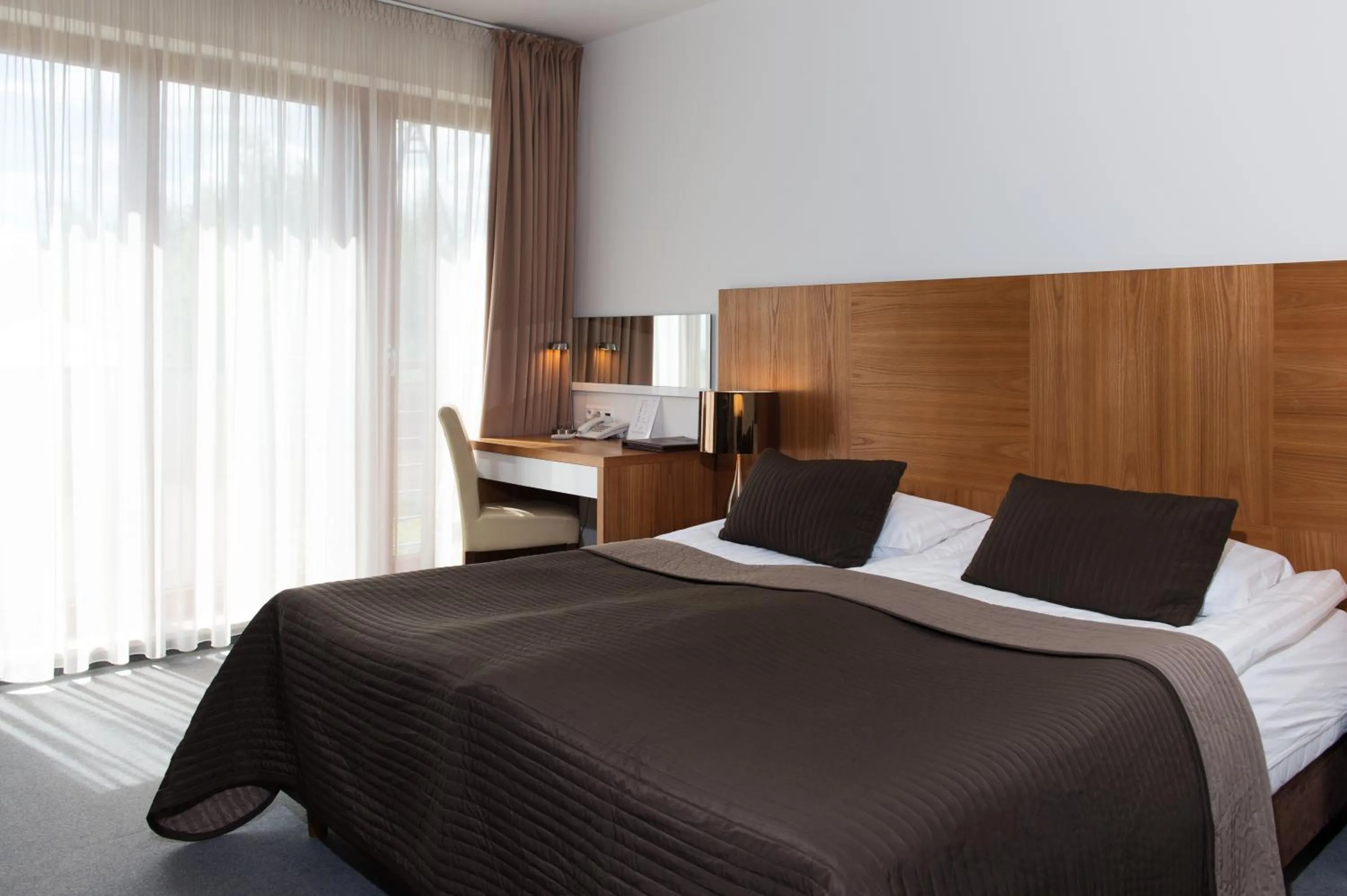 Bed in Bazuny Hotel&Spa