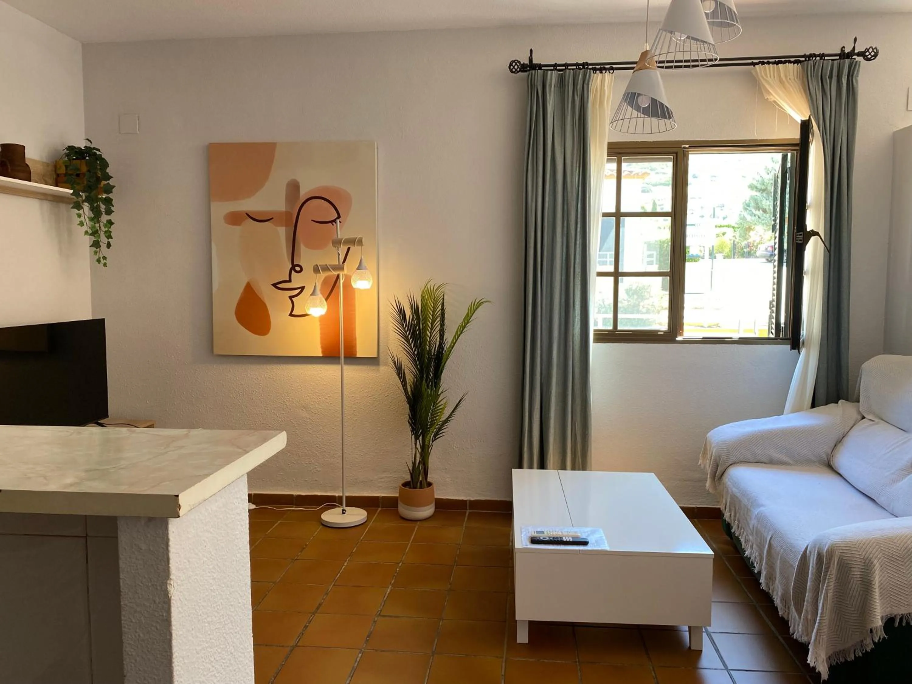 Living room, Bed in Apartamentos Atalayas Extremadura