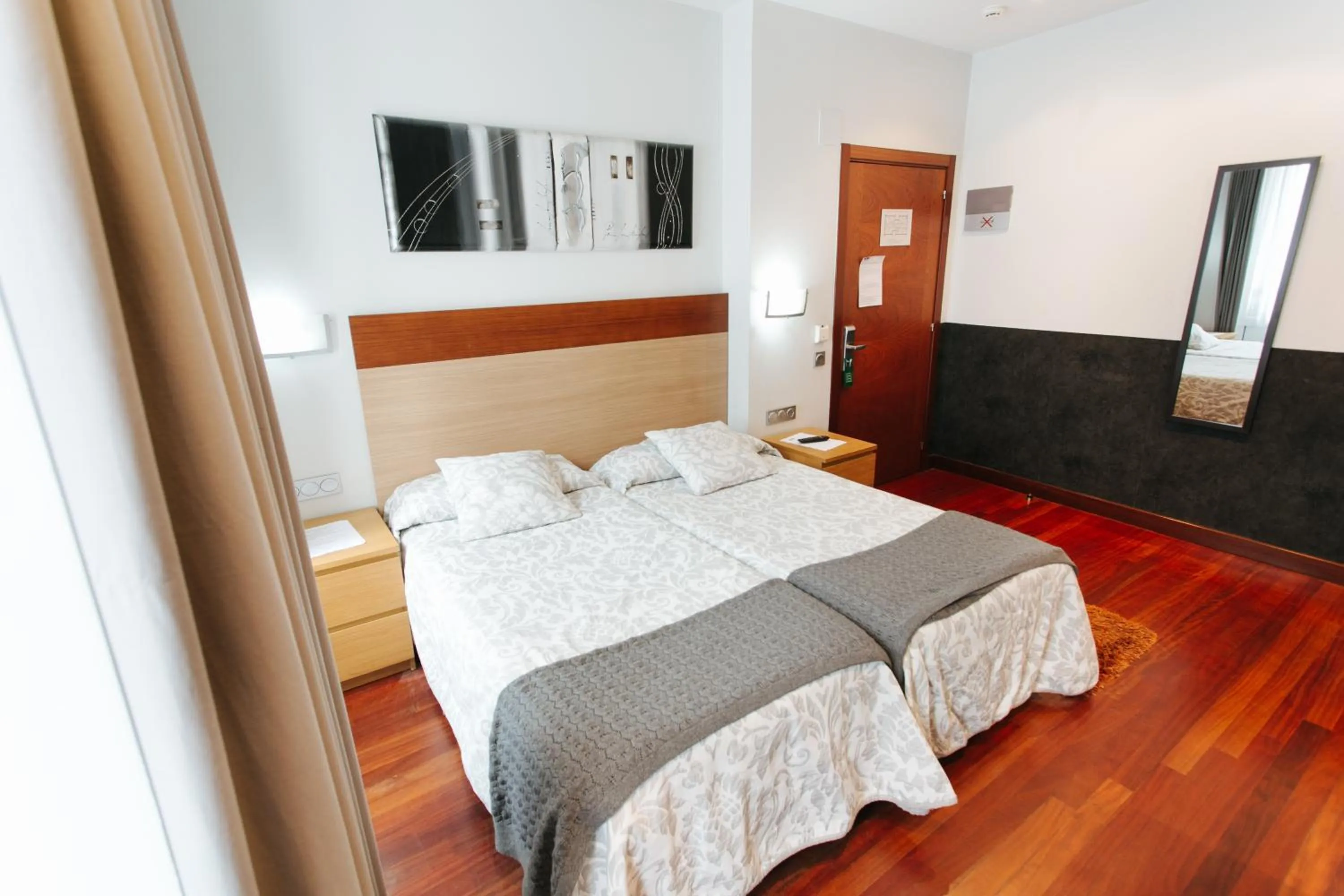 Photo of the whole room, Bed in Hostal San Sebastian Centro