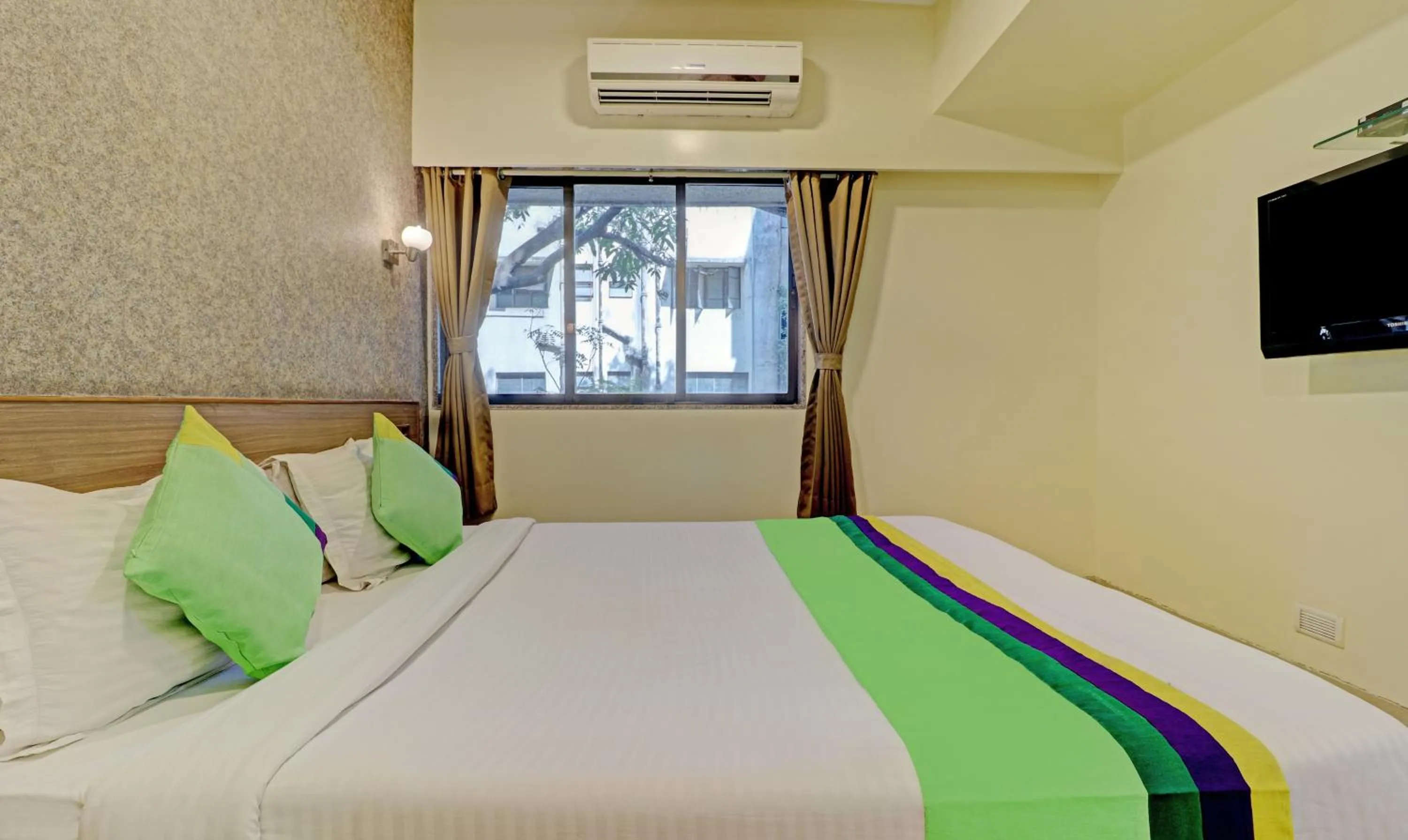 Bedroom, Bed in Treebo Vikrant Residency