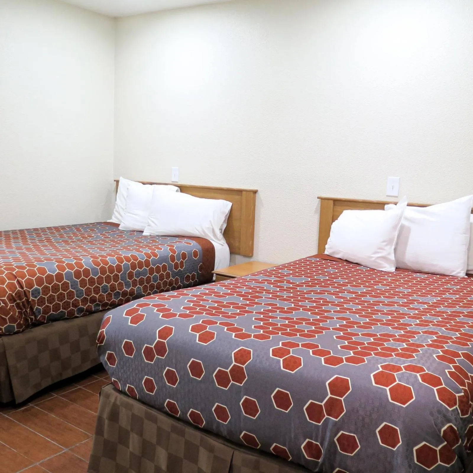 Bed in Townhouse Inn and Suites