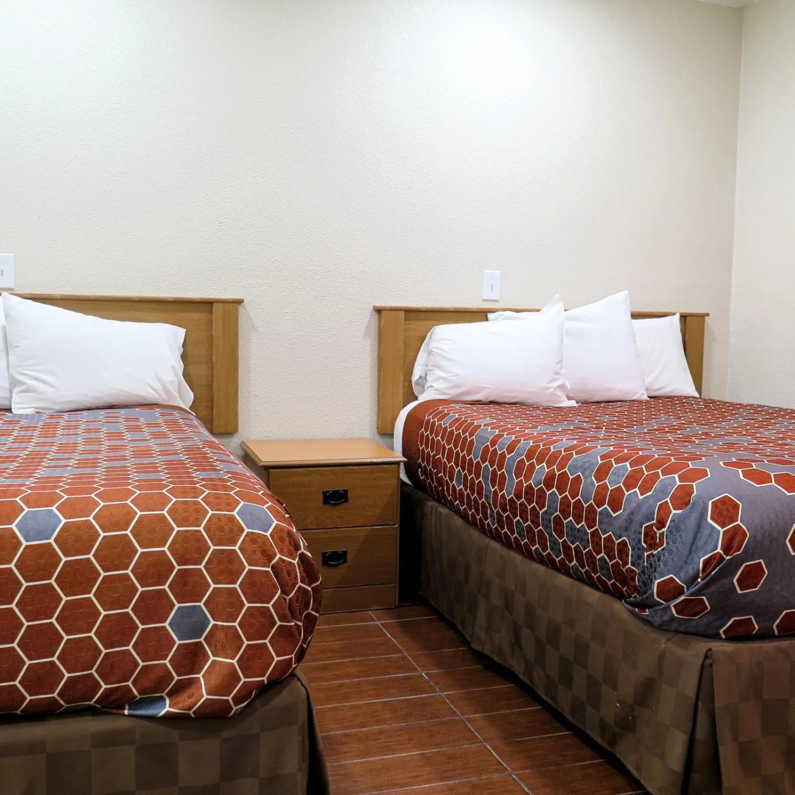 Bed in Townhouse Inn and Suites