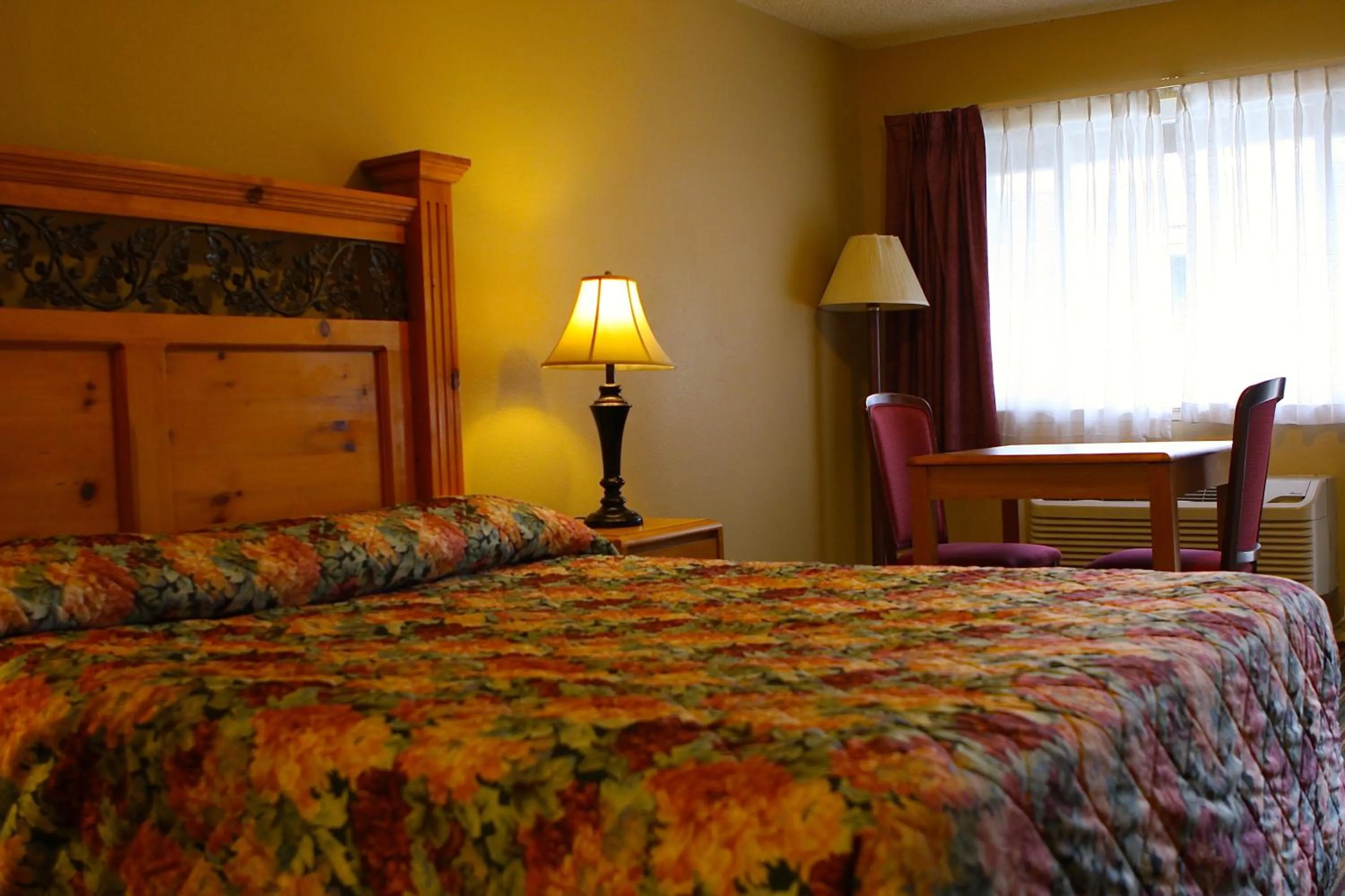 Bed in San Luis Inn and Suites