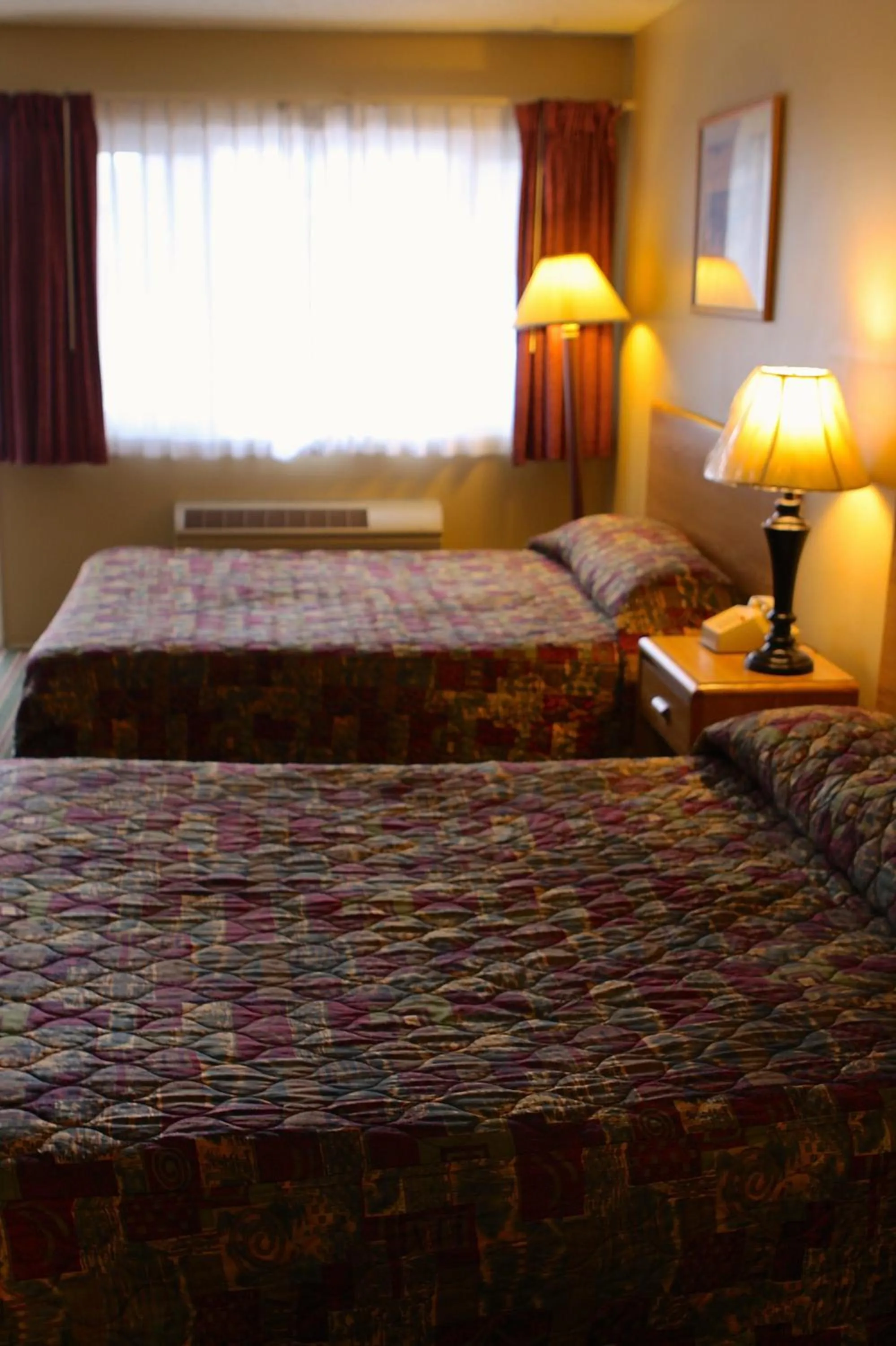 Bed in San Luis Inn and Suites