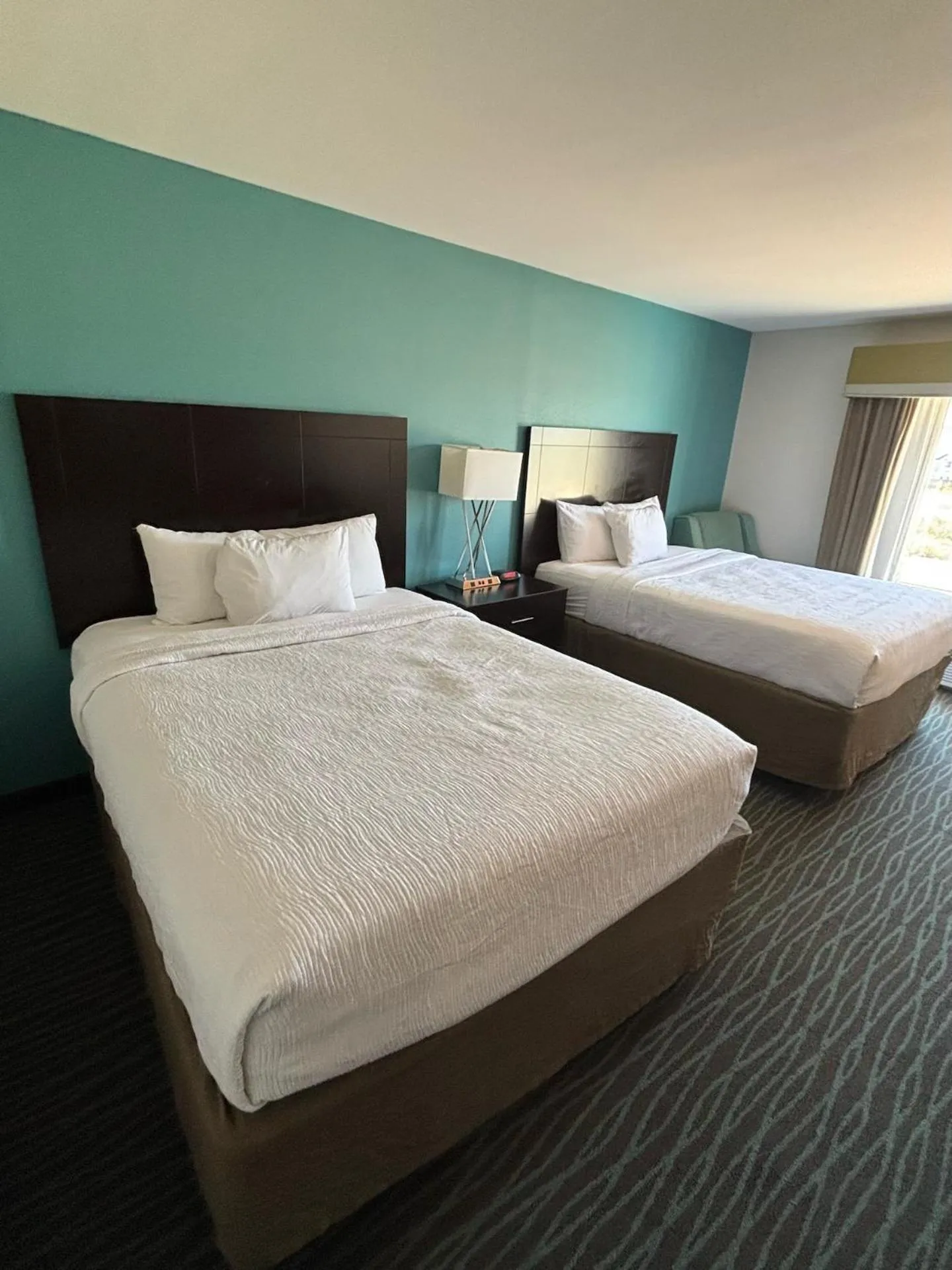 Bed in Ramada by Wyndham Burkburnett - Wichita Falls