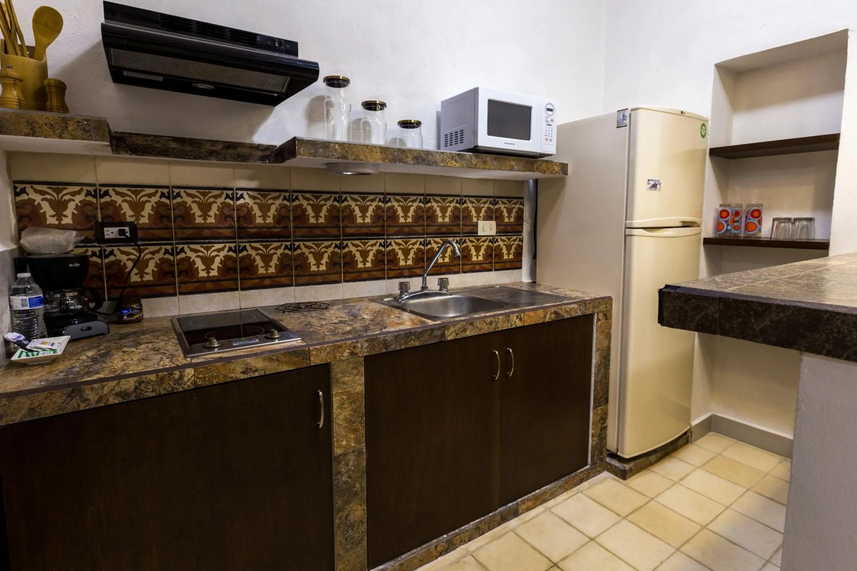 Kitchen or kitchenette in Merida Serviced Apartments
