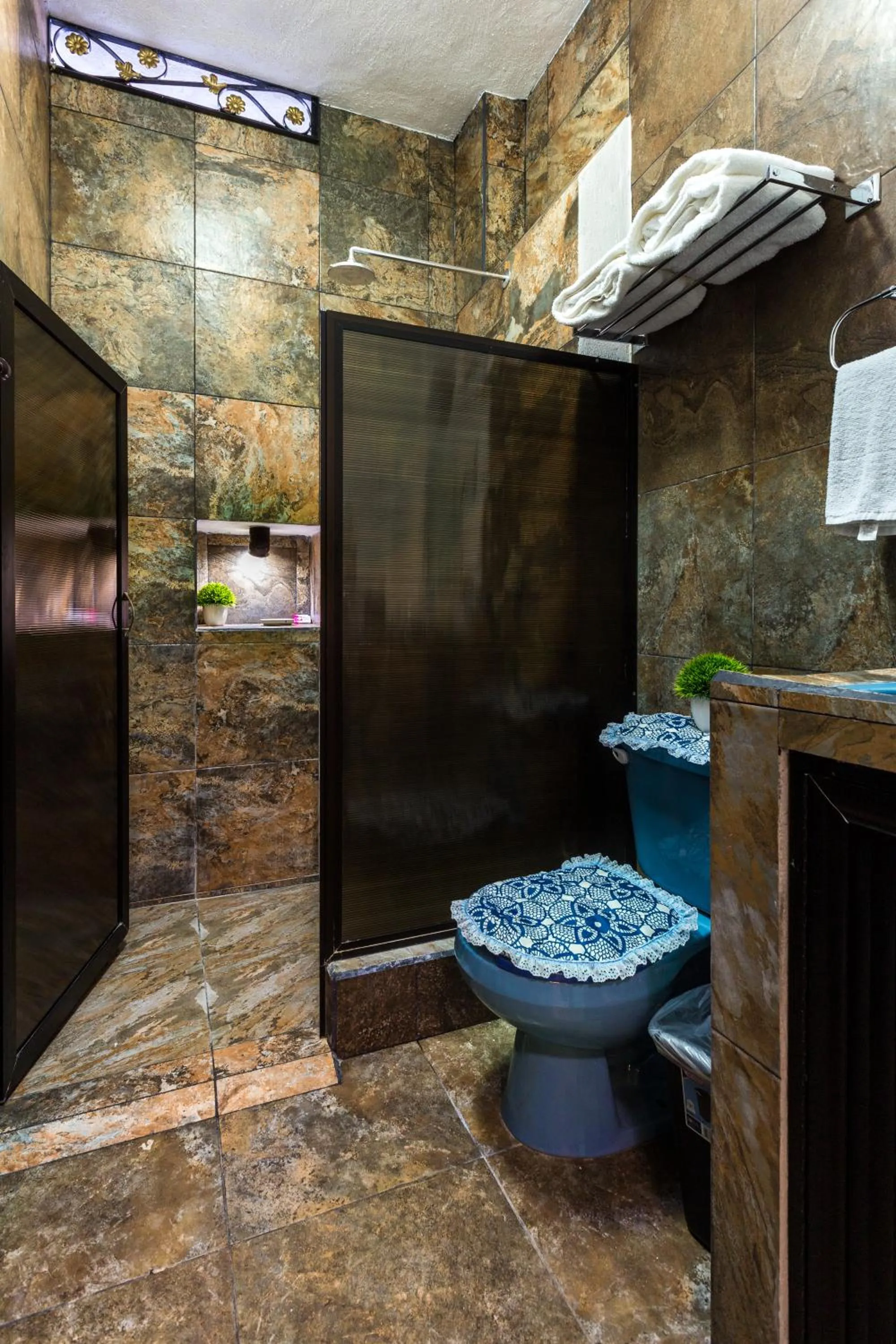 Toilet in Merida Serviced Apartments