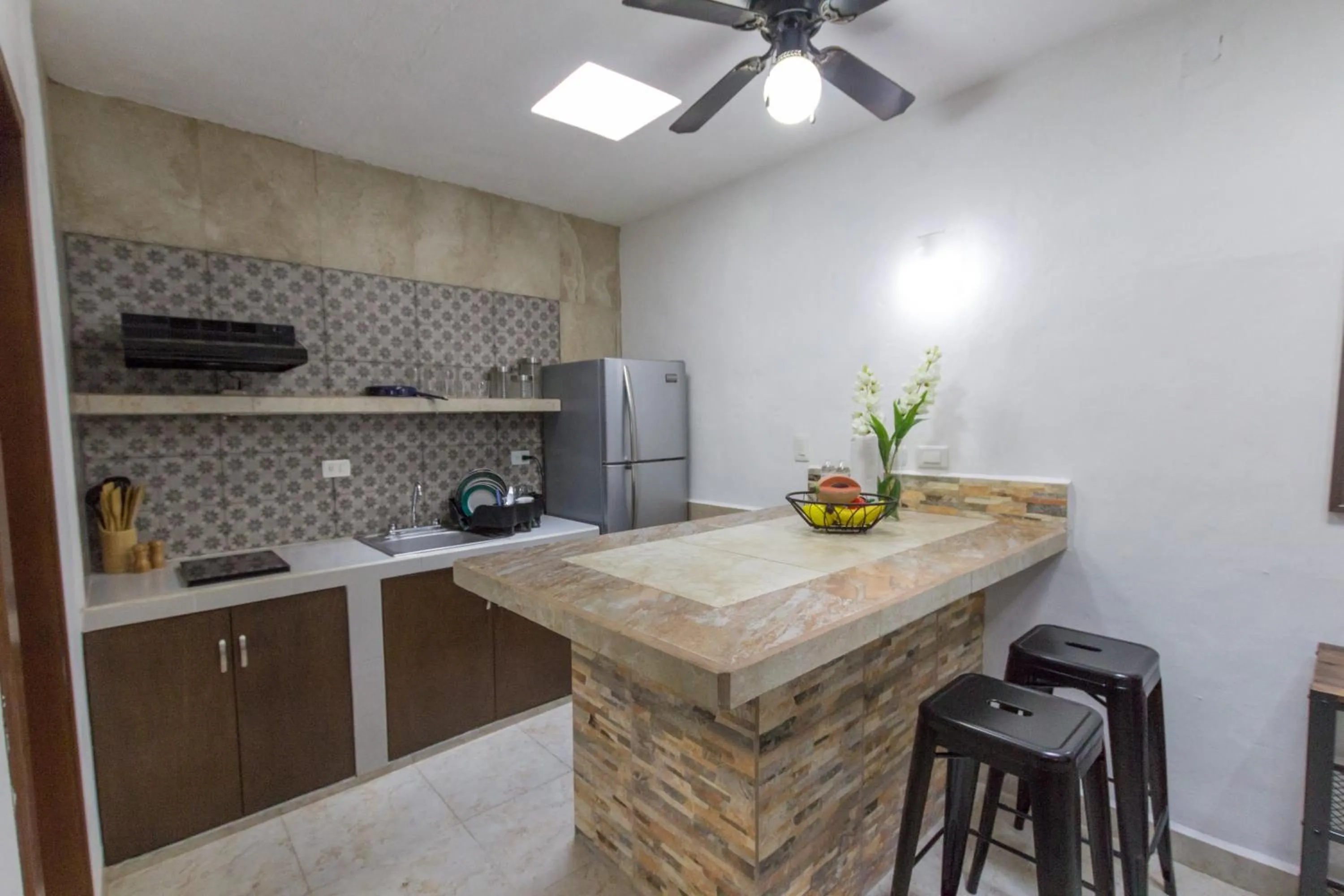 Kitchen or kitchenette in Merida Serviced Apartments
