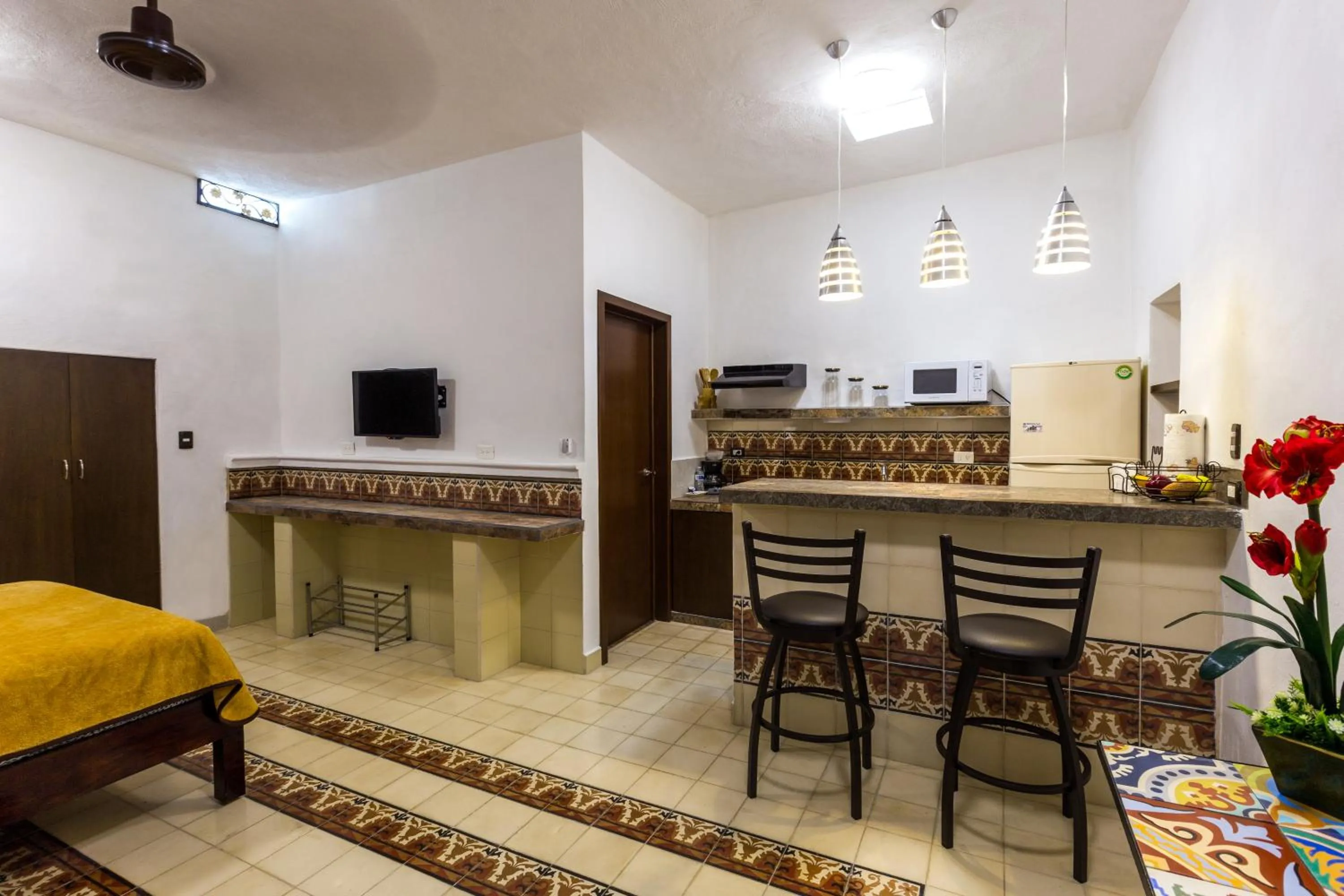 Kitchen or kitchenette in Merida Serviced Apartments