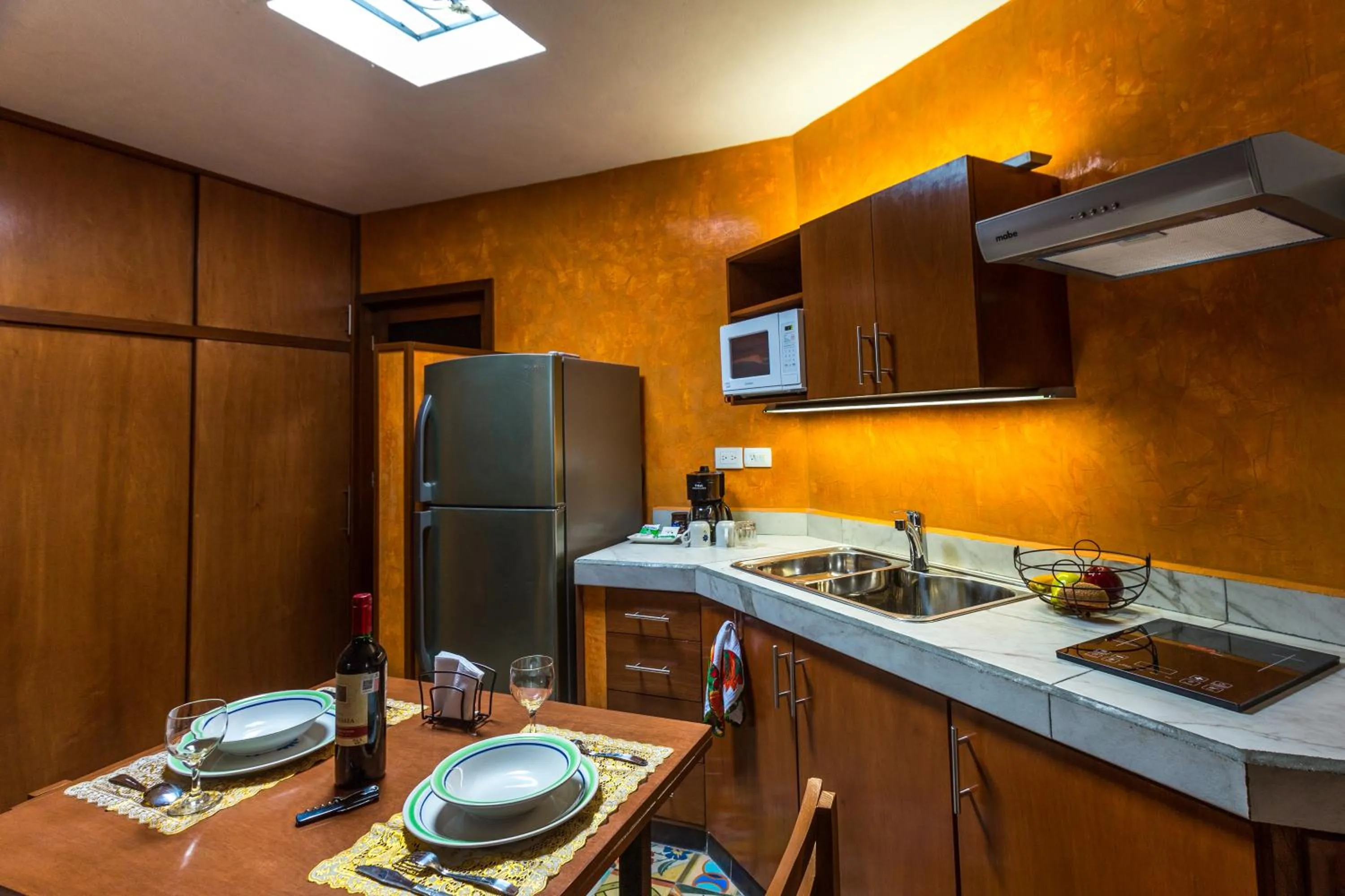 Kitchen or kitchenette in Merida Serviced Apartments