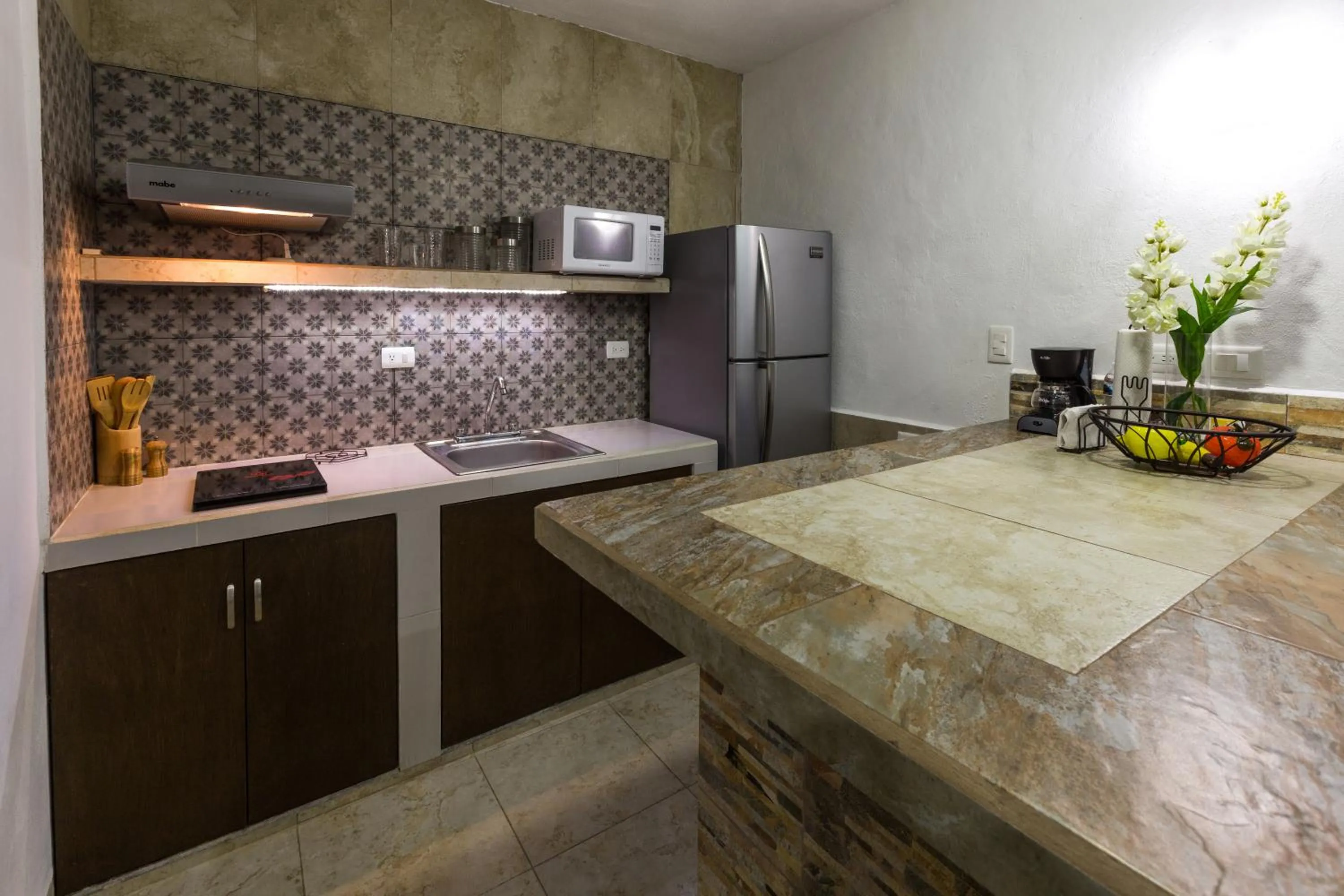 Kitchen or kitchenette in Merida Serviced Apartments