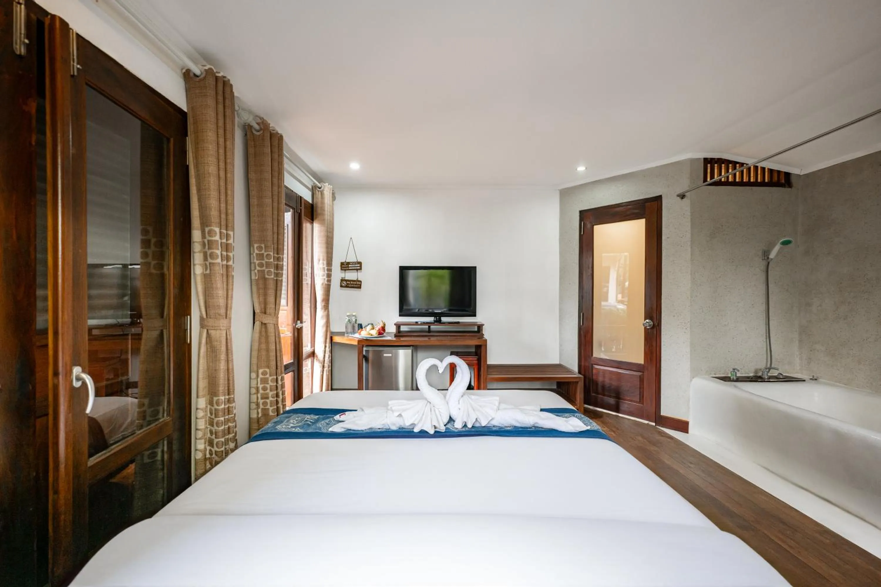 Bed in Ancient Luangprabang Hotel