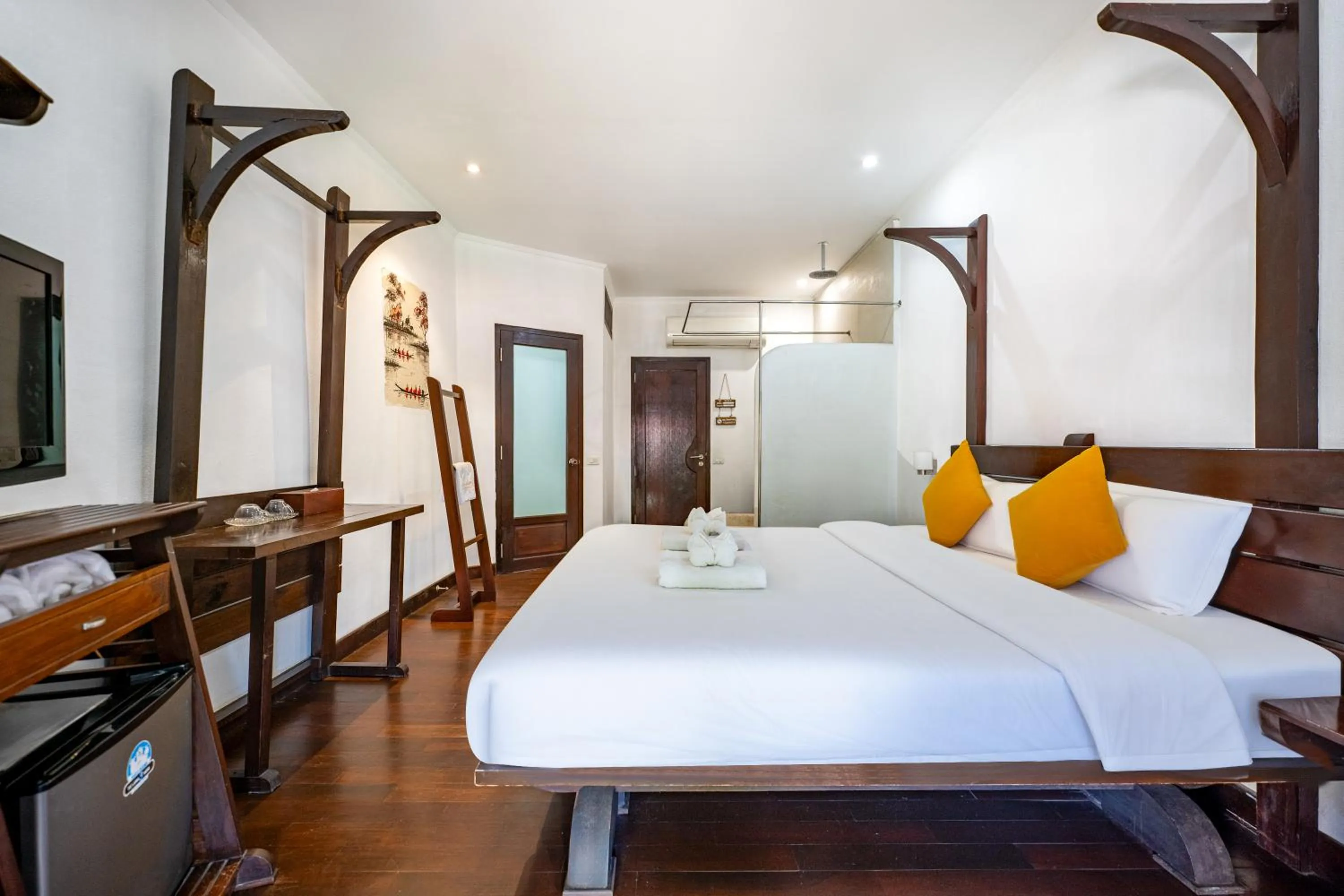 Bed in Ancient Luangprabang Hotel