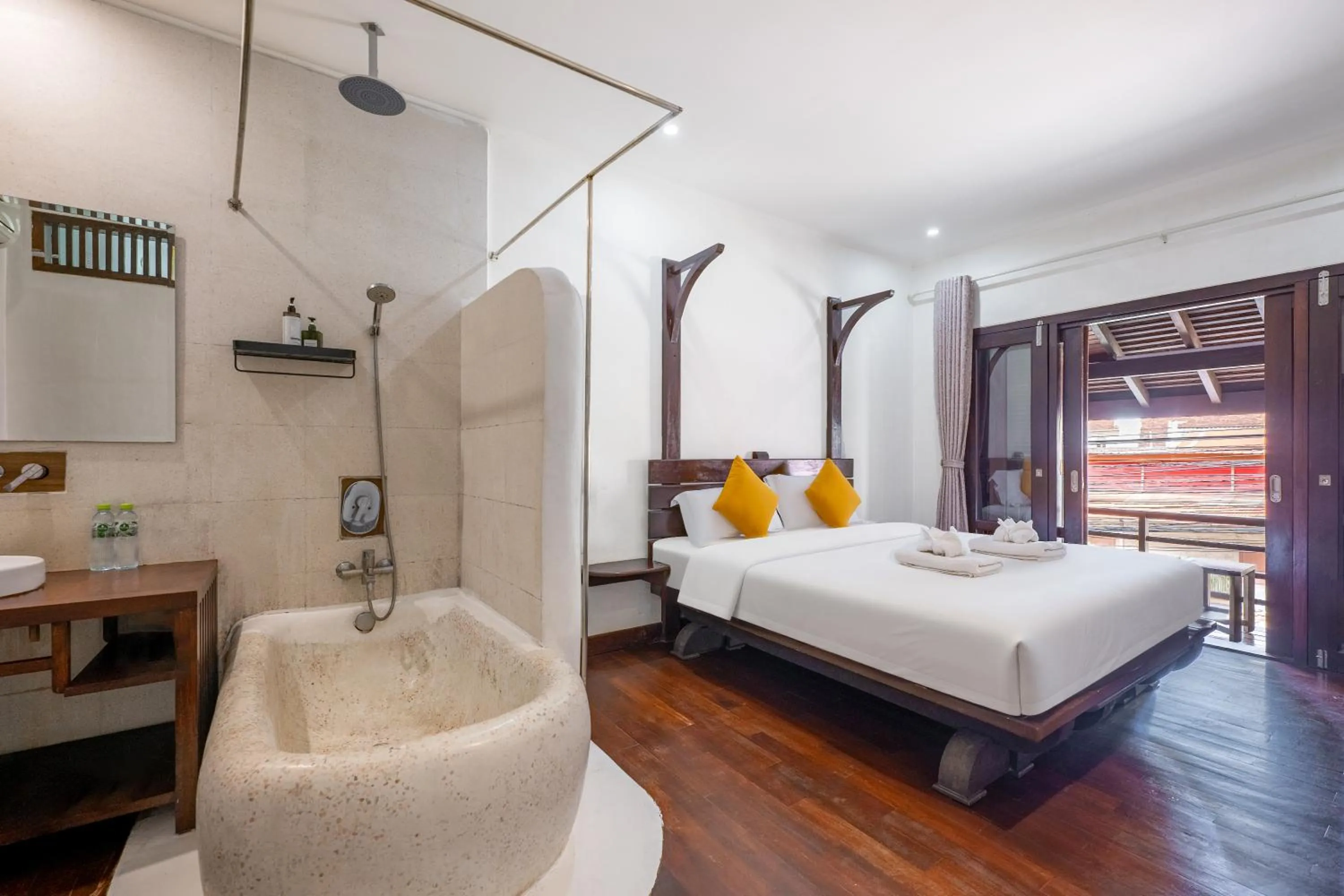 Bed in Ancient Luangprabang Hotel