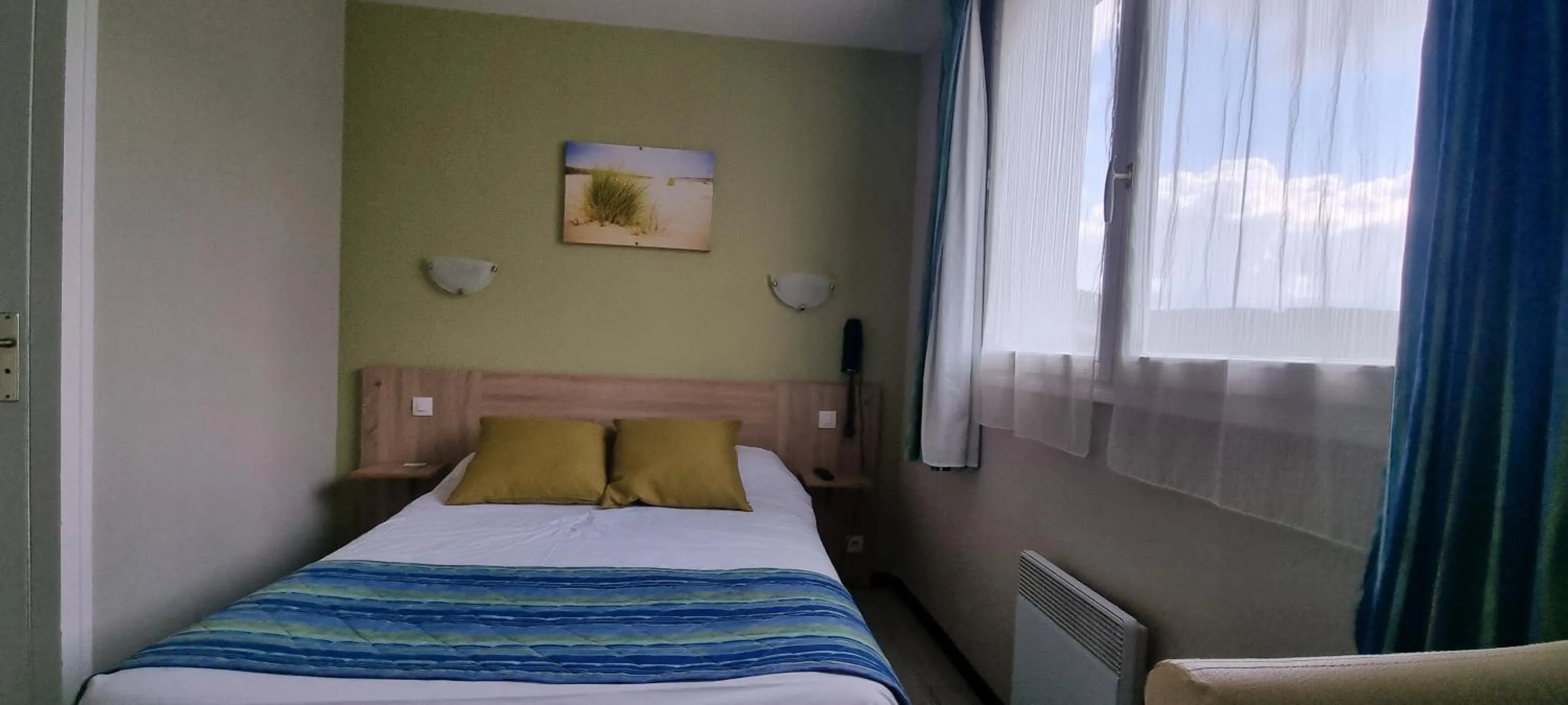 Bed in Hotel du Haut Marais