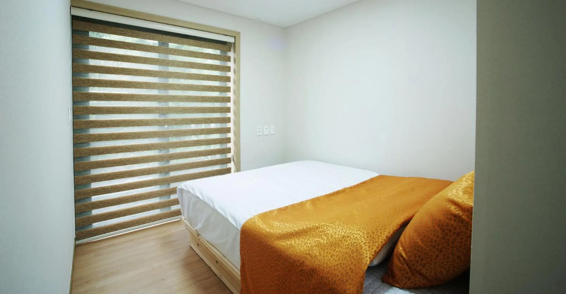 Bed in Gotjawal Geomunoreum Pension