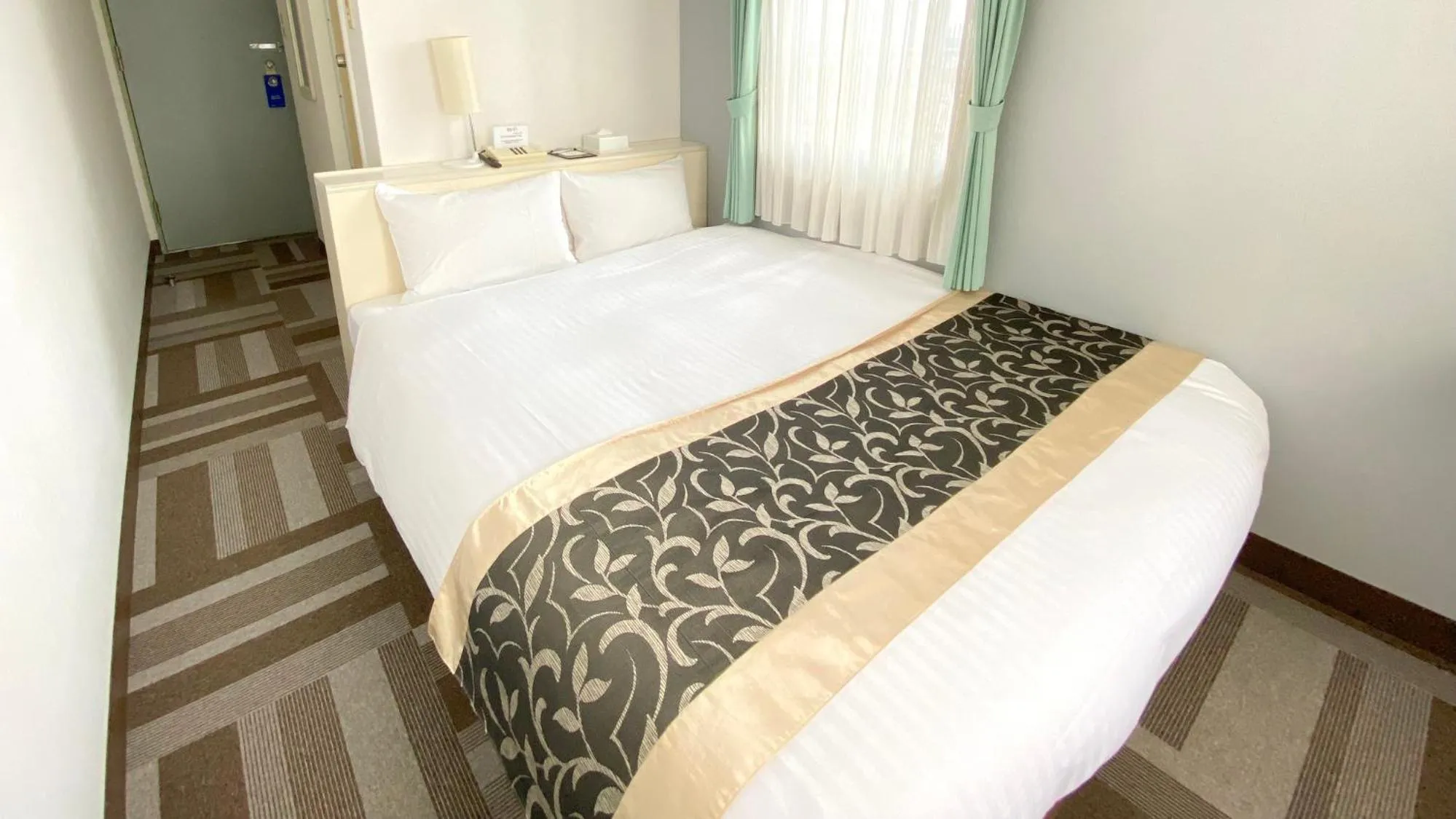 Bed in Hotel Chatelet Inn Kyoto