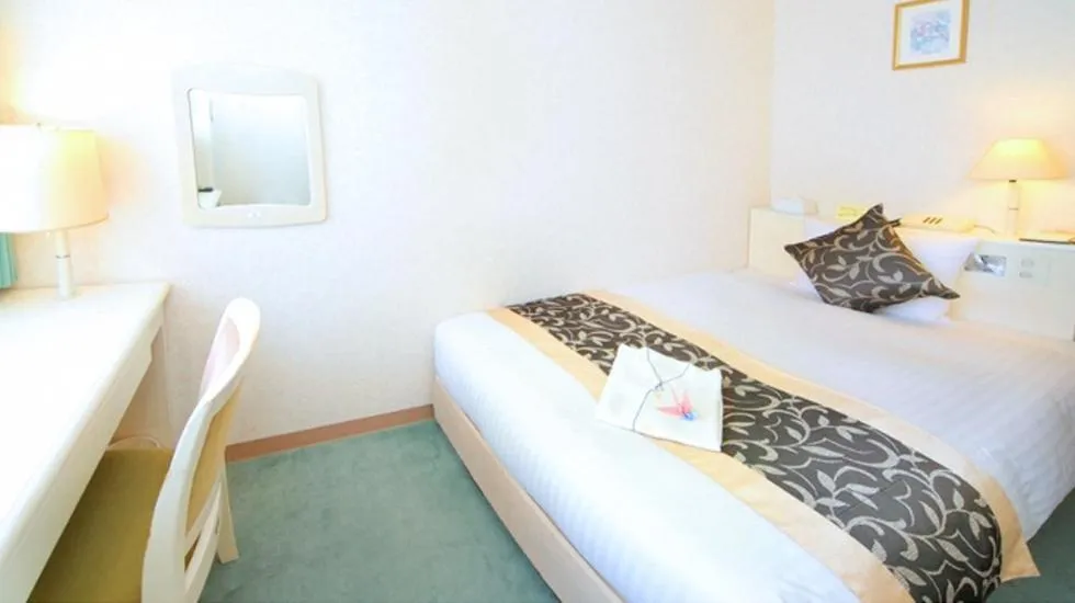 Bed in Hotel Chatelet Inn Kyoto