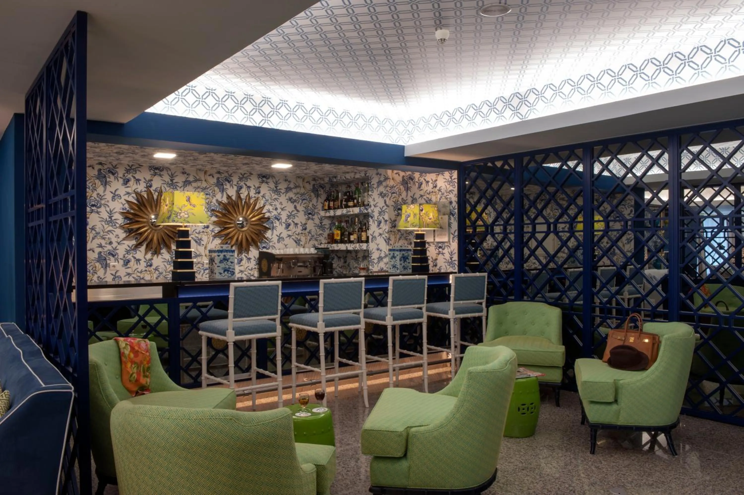 Communal lounge/ TV room in Coração de Fatima Boutique Hotel