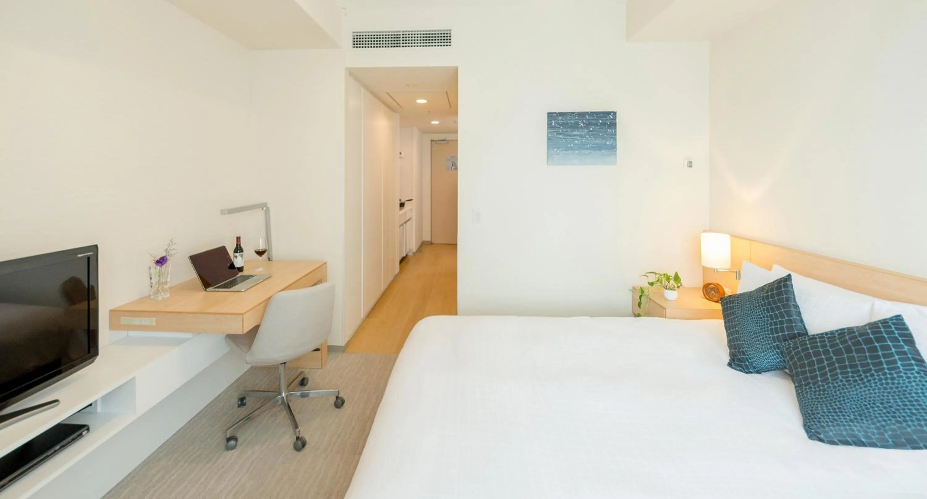 Bed in Fraser Residence Nankai Osaka