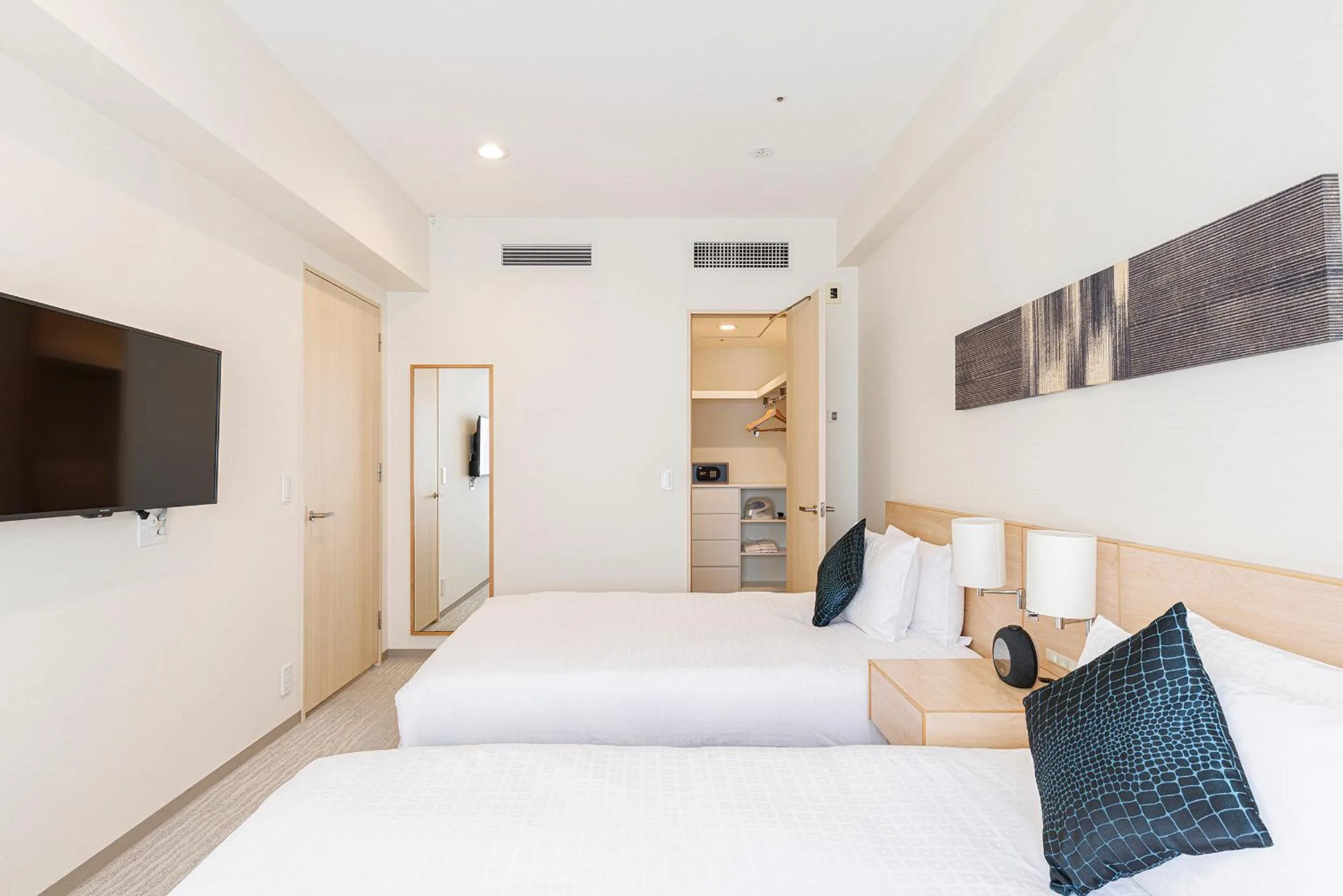 Bed in Fraser Residence Nankai Osaka