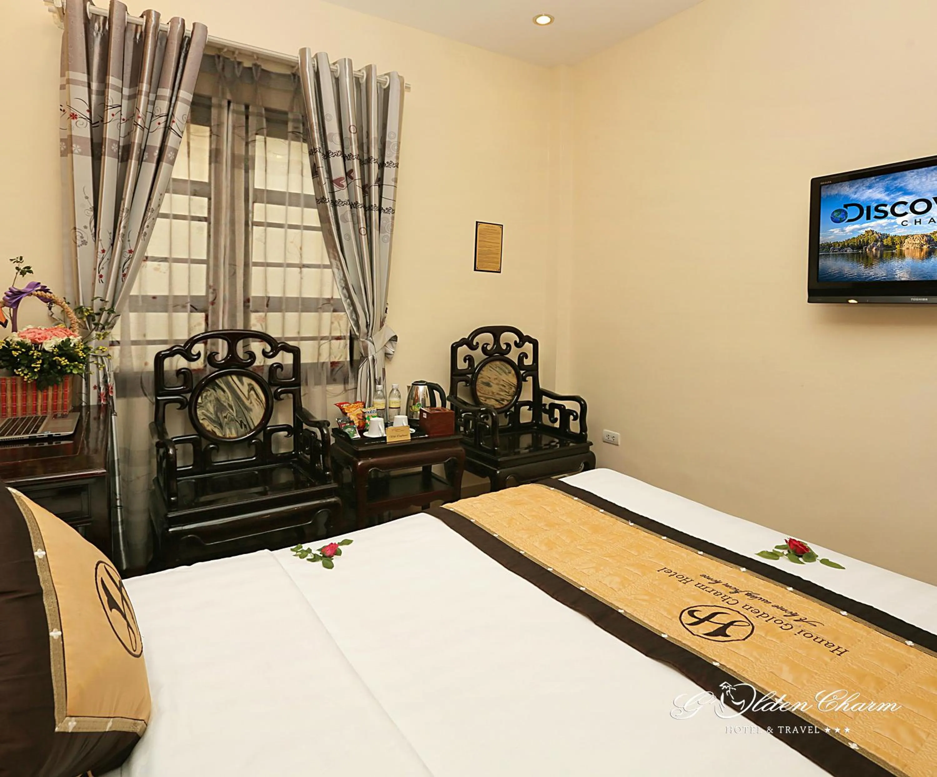 Bedroom in Hanoi Golden Charm Hotel