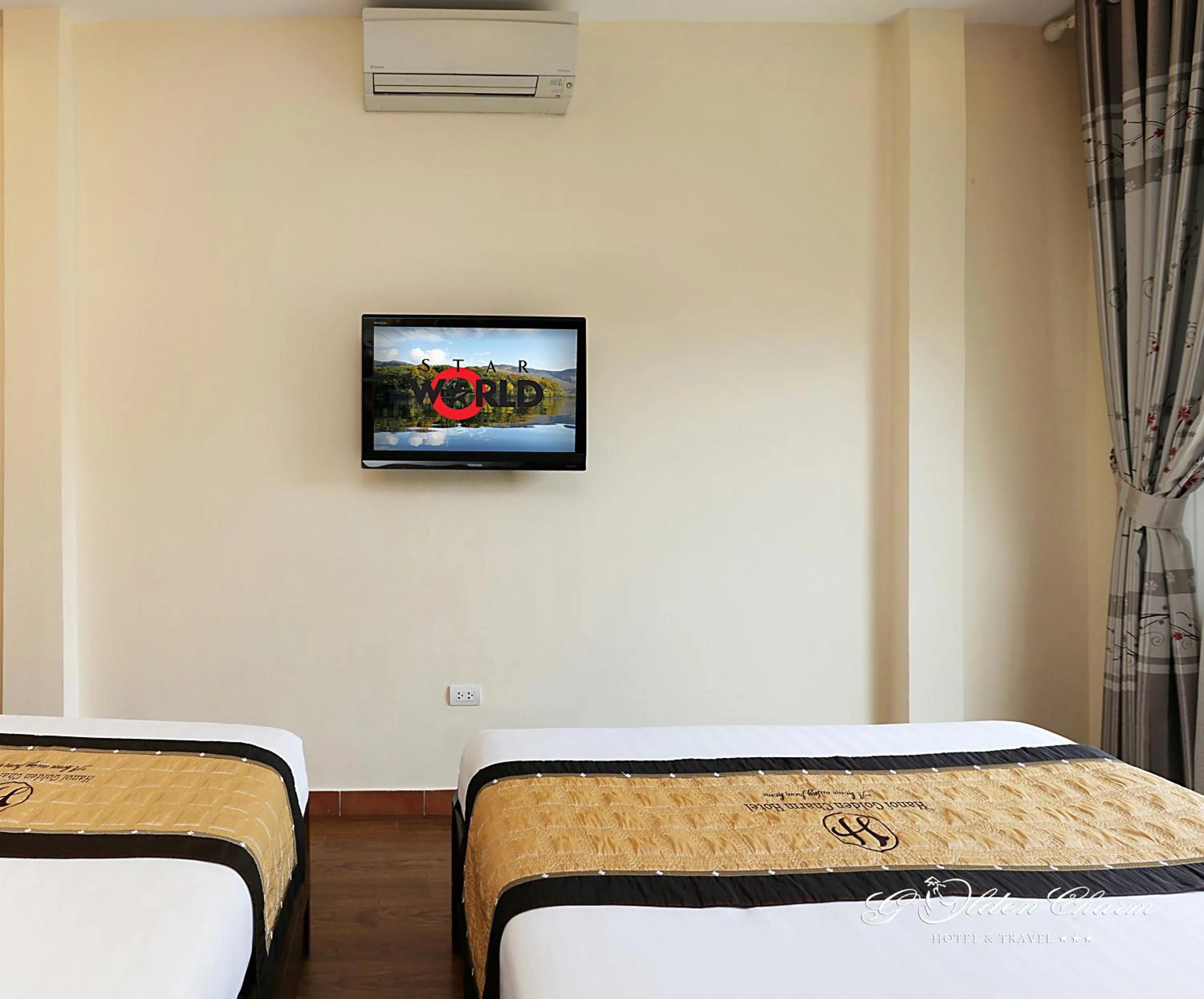 Bedroom in Hanoi Golden Charm Hotel