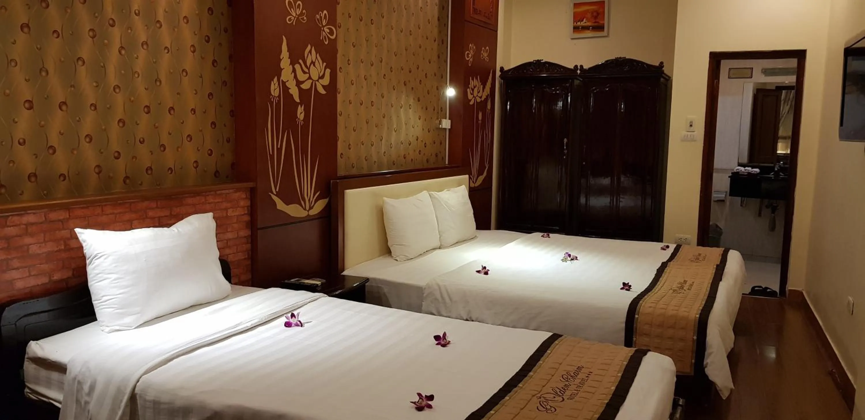 Bedroom in Hanoi Golden Charm Hotel