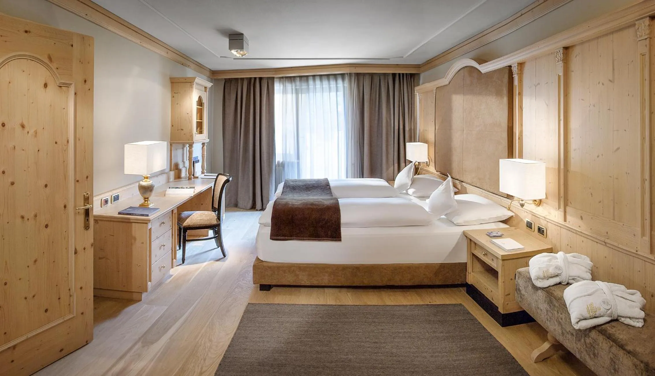 Bedroom, Bed in Gardena Grödnerhof - Hotel & Spa