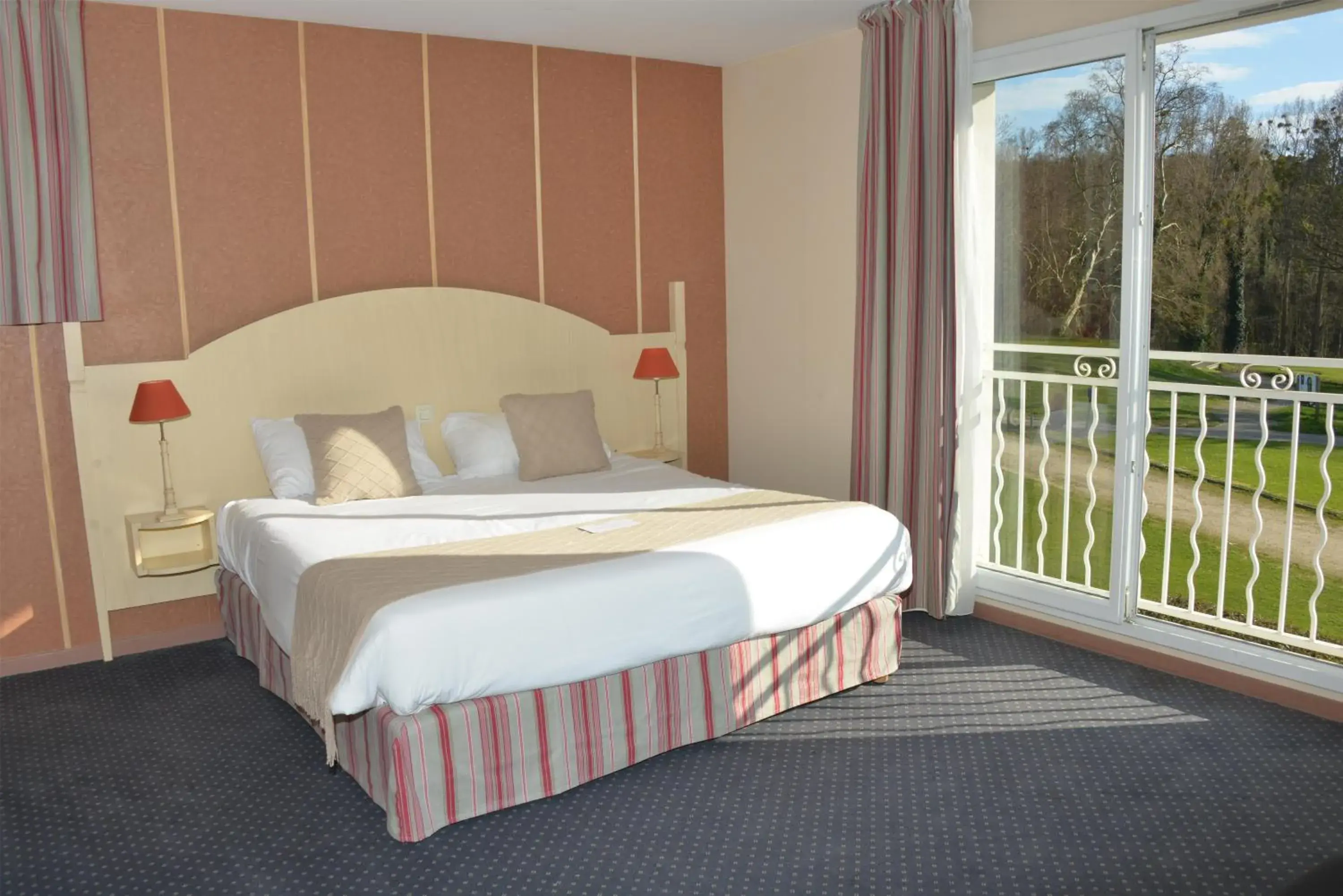 Family Room with One King and One Double Bed in Best Western Golf d'Albon Family Room with One King and One Double Bed in Best Western Golf d'Albon