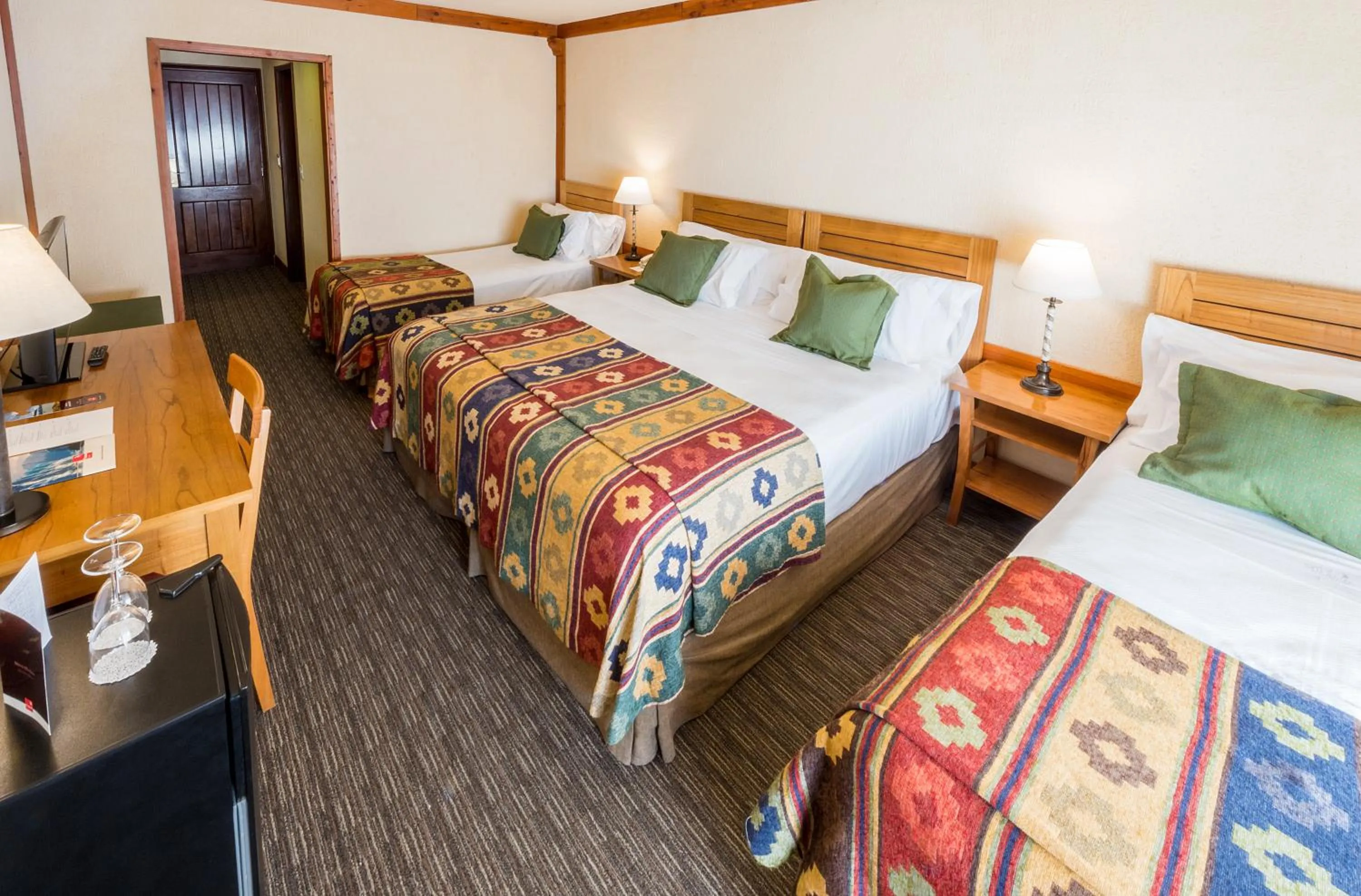 Bed in Mirador del Lago Hotel