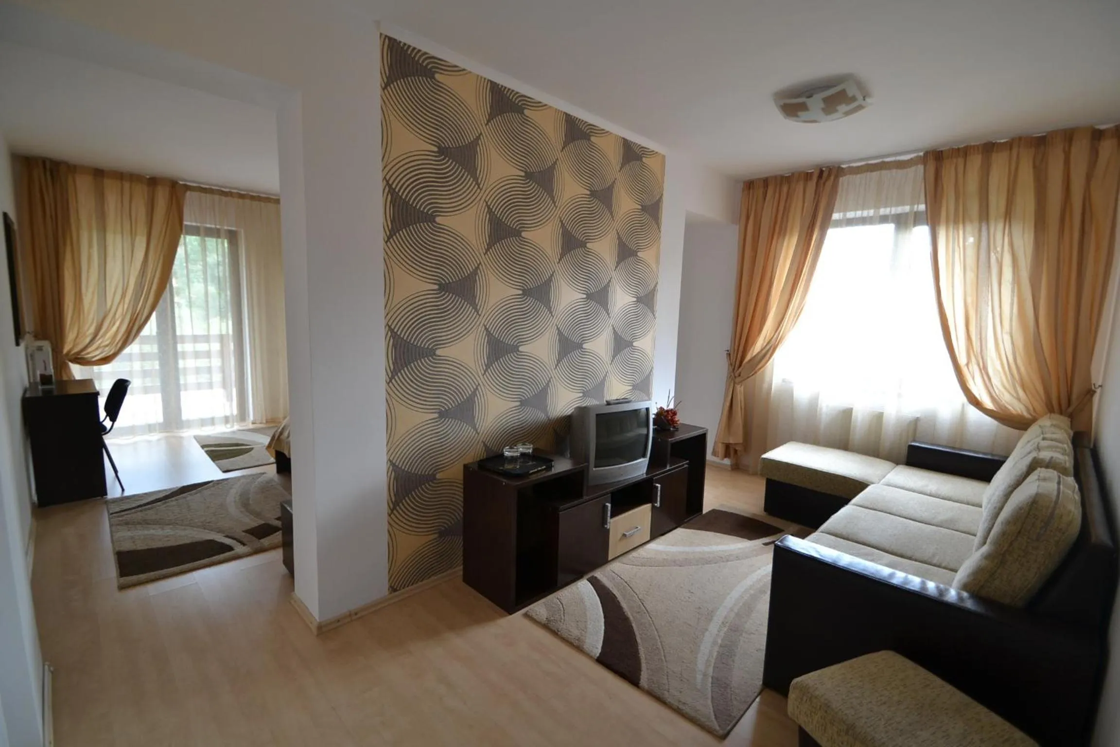 Living room, Bed in Hotel boutique Garden Resort by Brancoveanu