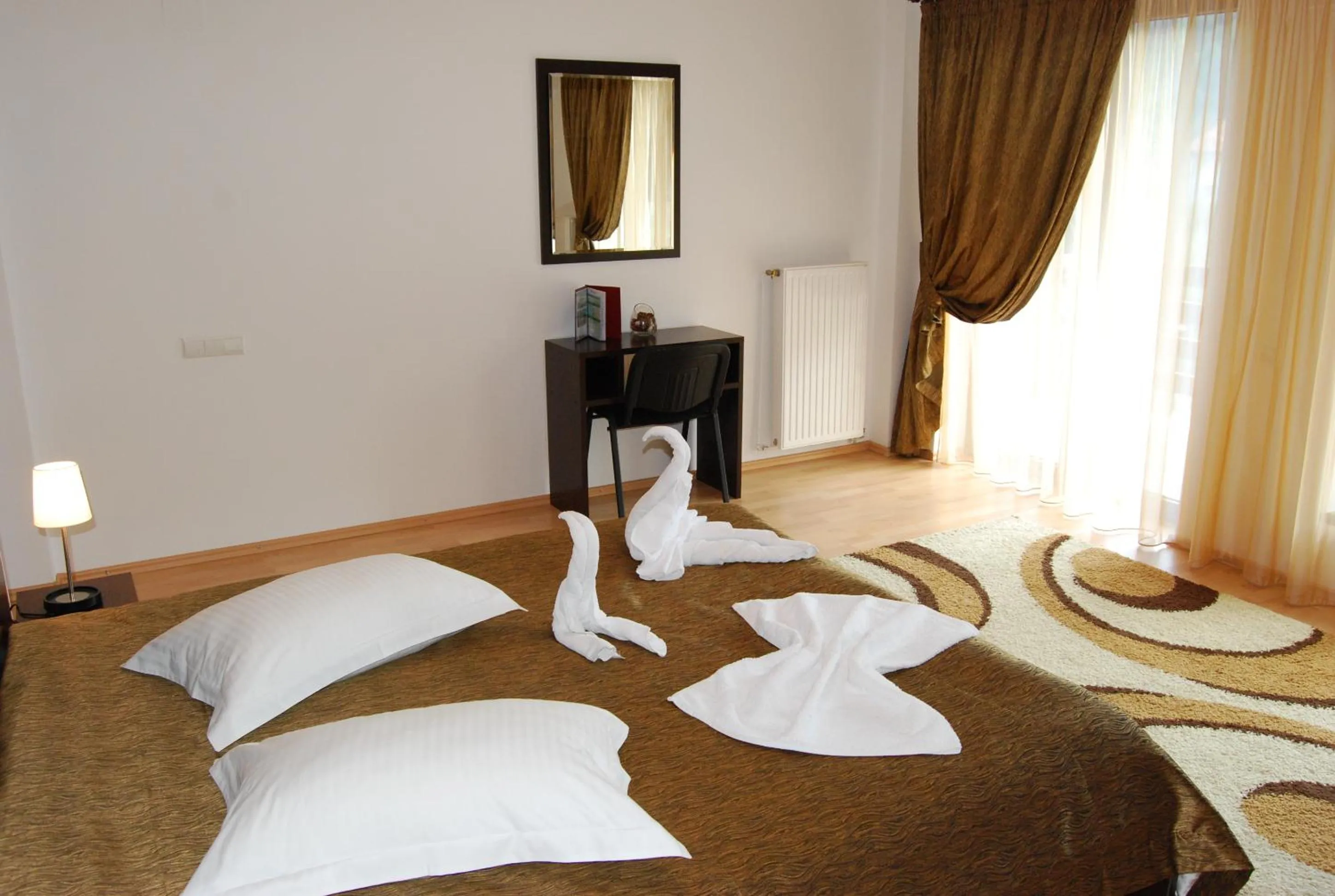 Bed in Hotel boutique Garden Resort by Brancoveanu