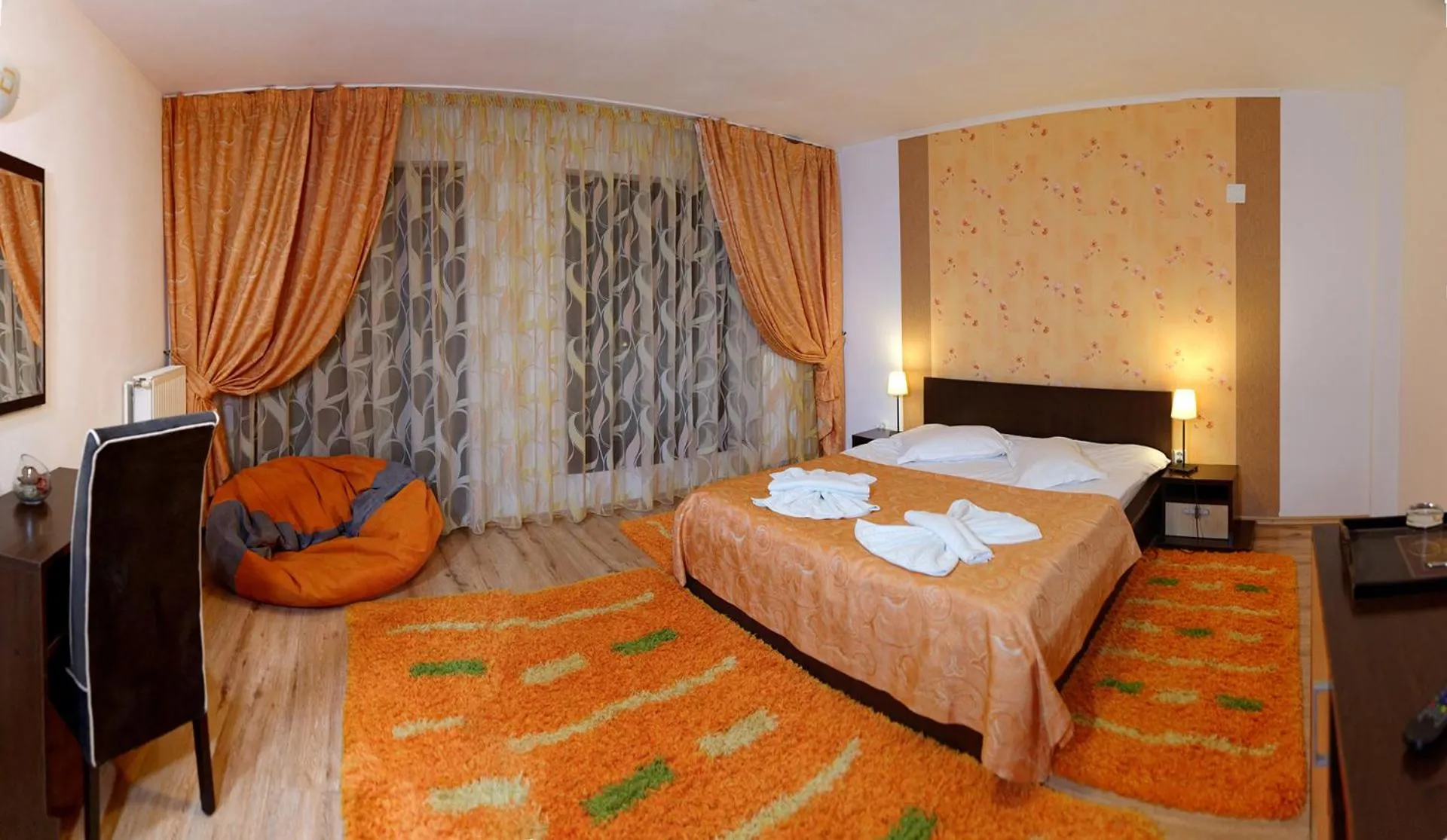 Photo of the whole room, Bed in Hotel boutique Garden Resort by Brancoveanu