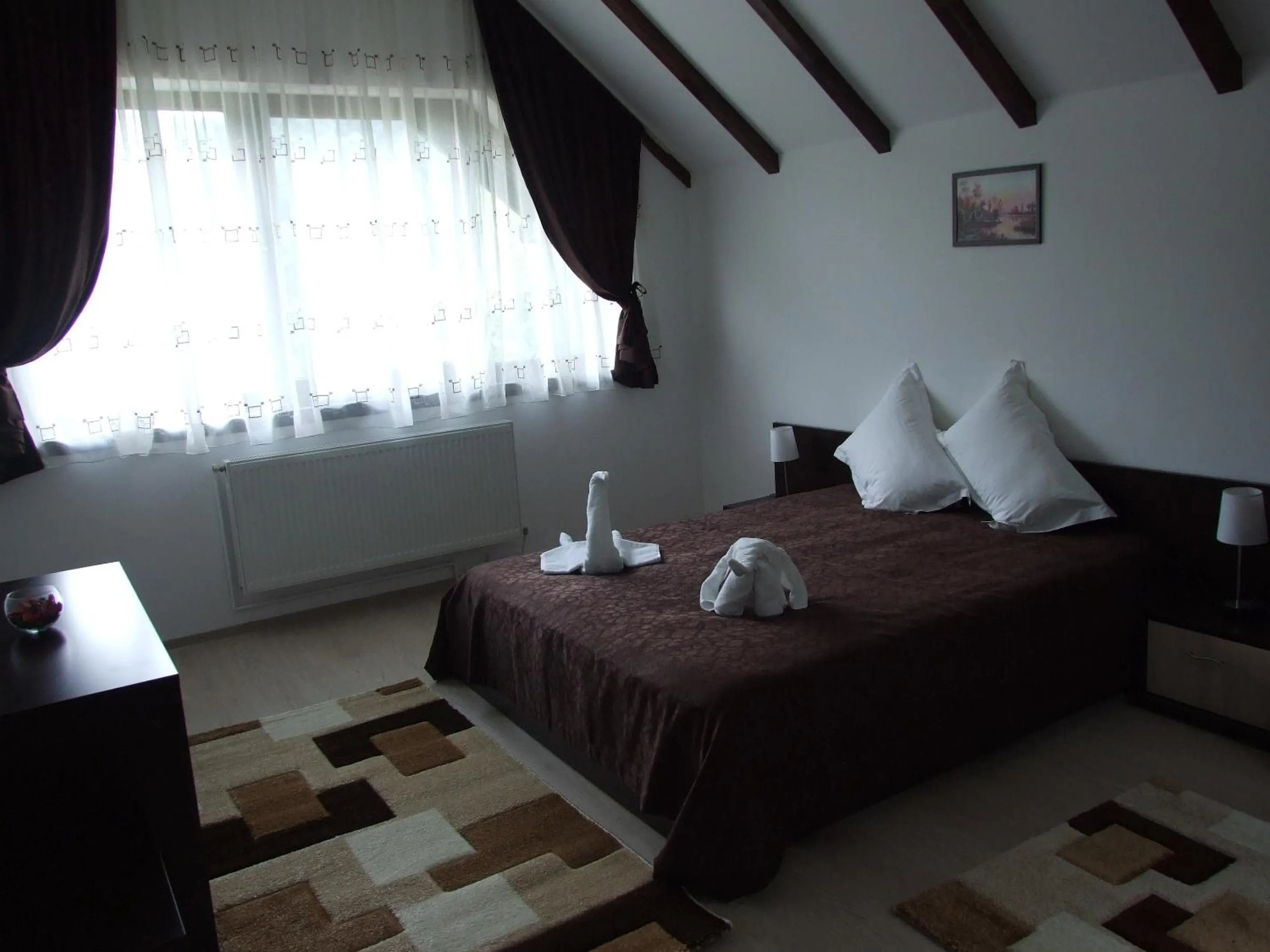 Bed in Hotel boutique Garden Resort by Brancoveanu