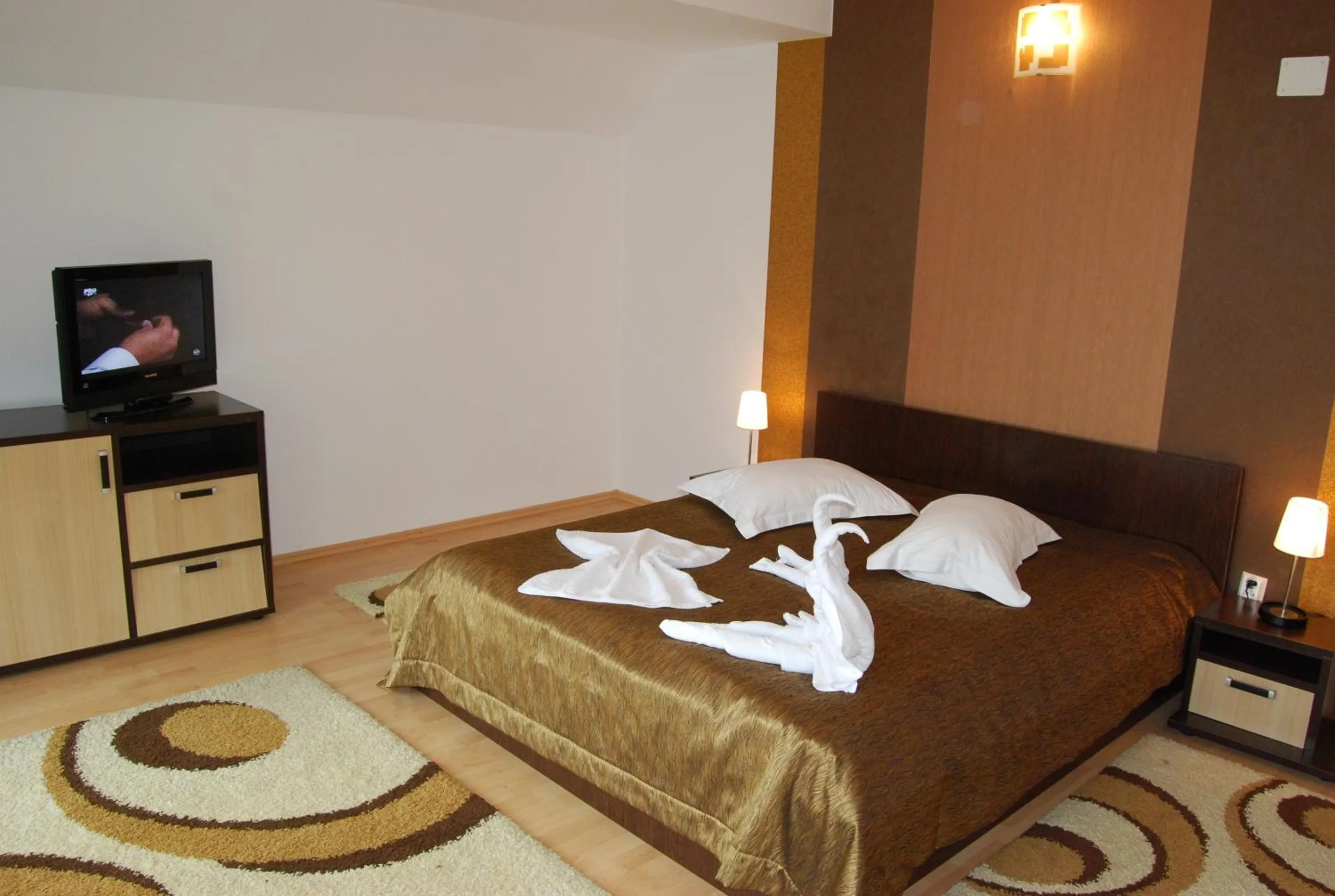 Bed in Hotel boutique Garden Resort by Brancoveanu