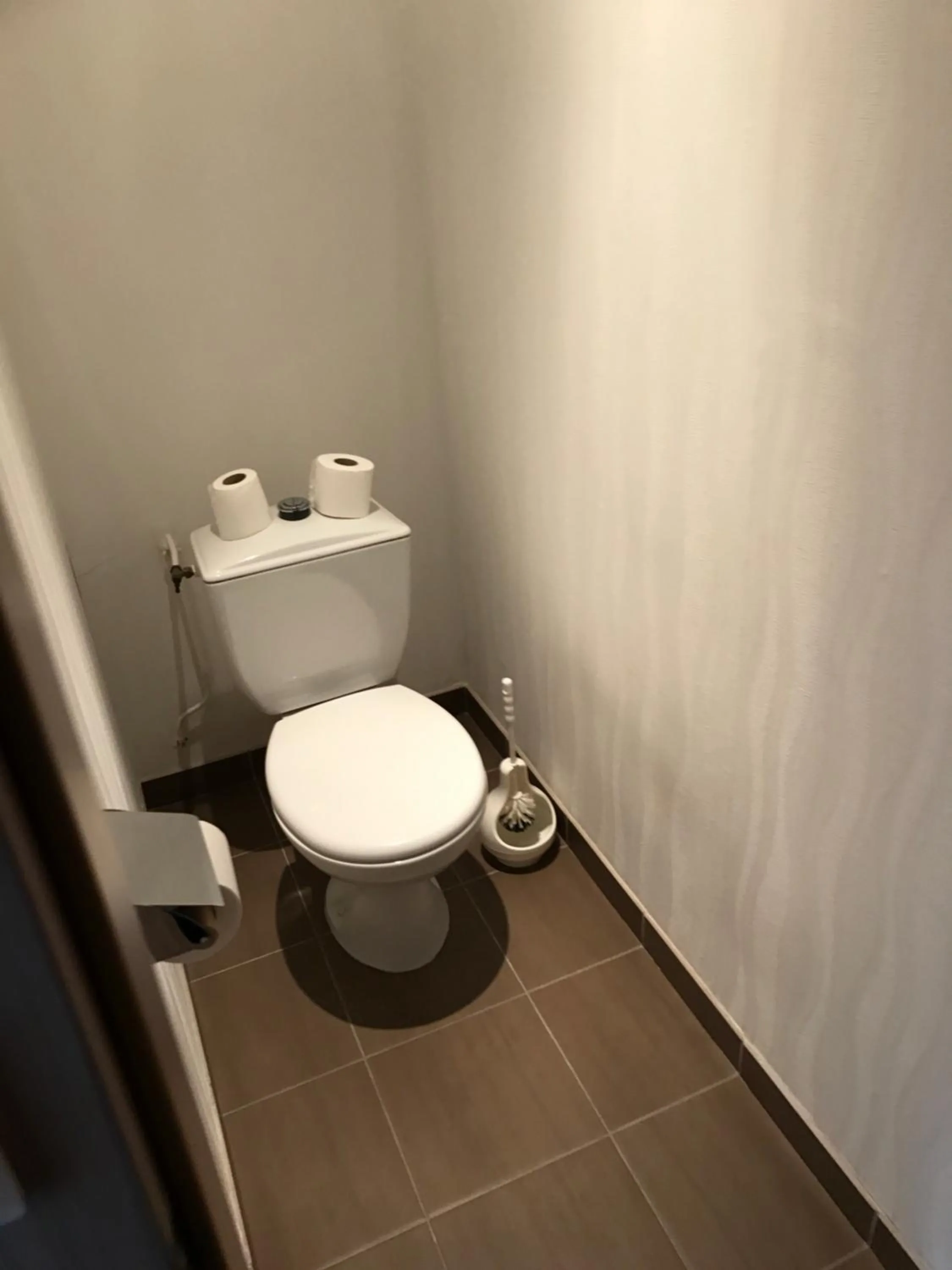 Toilet in Logis Hotel de la Gare
