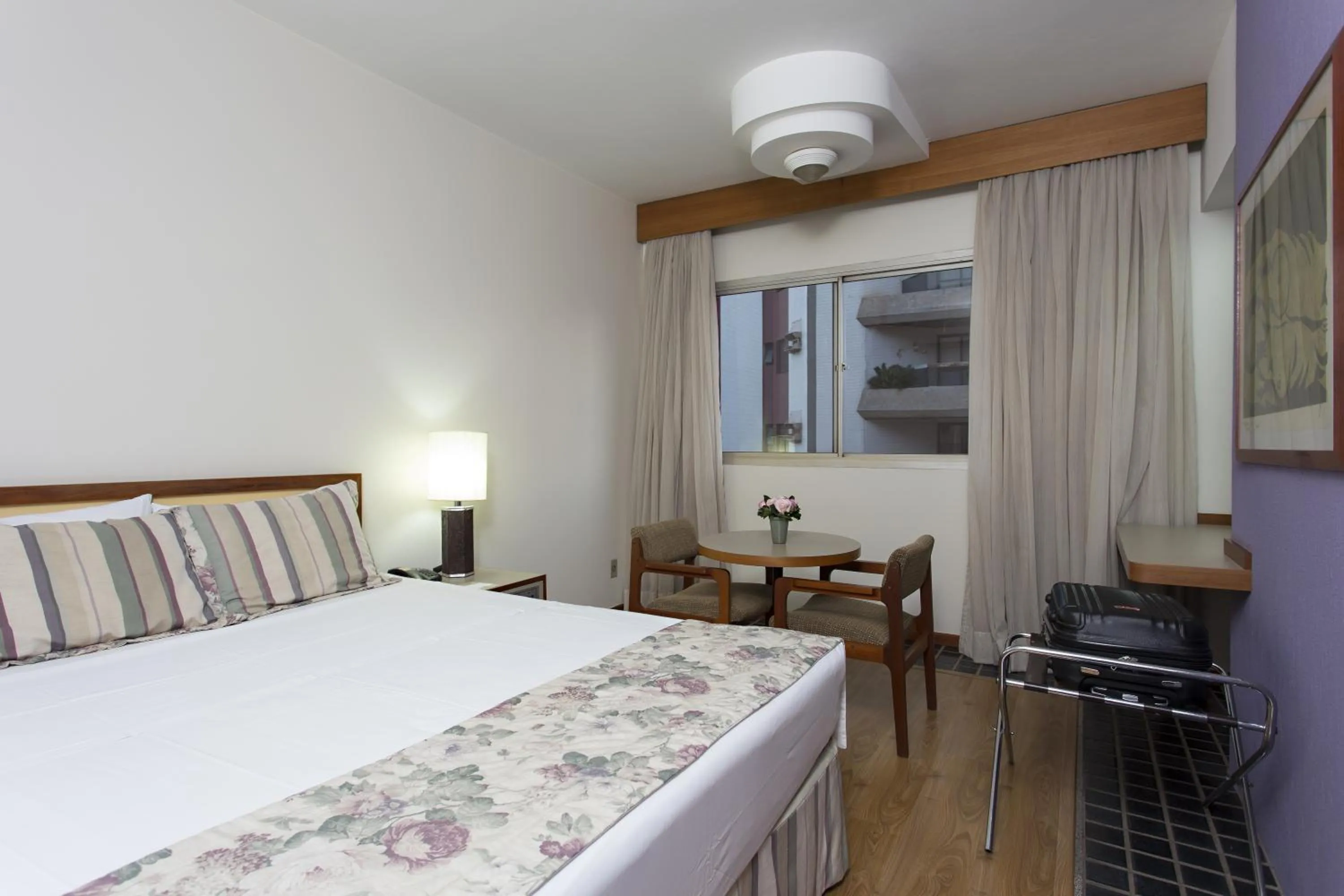 Bed in Black Stream Hotel