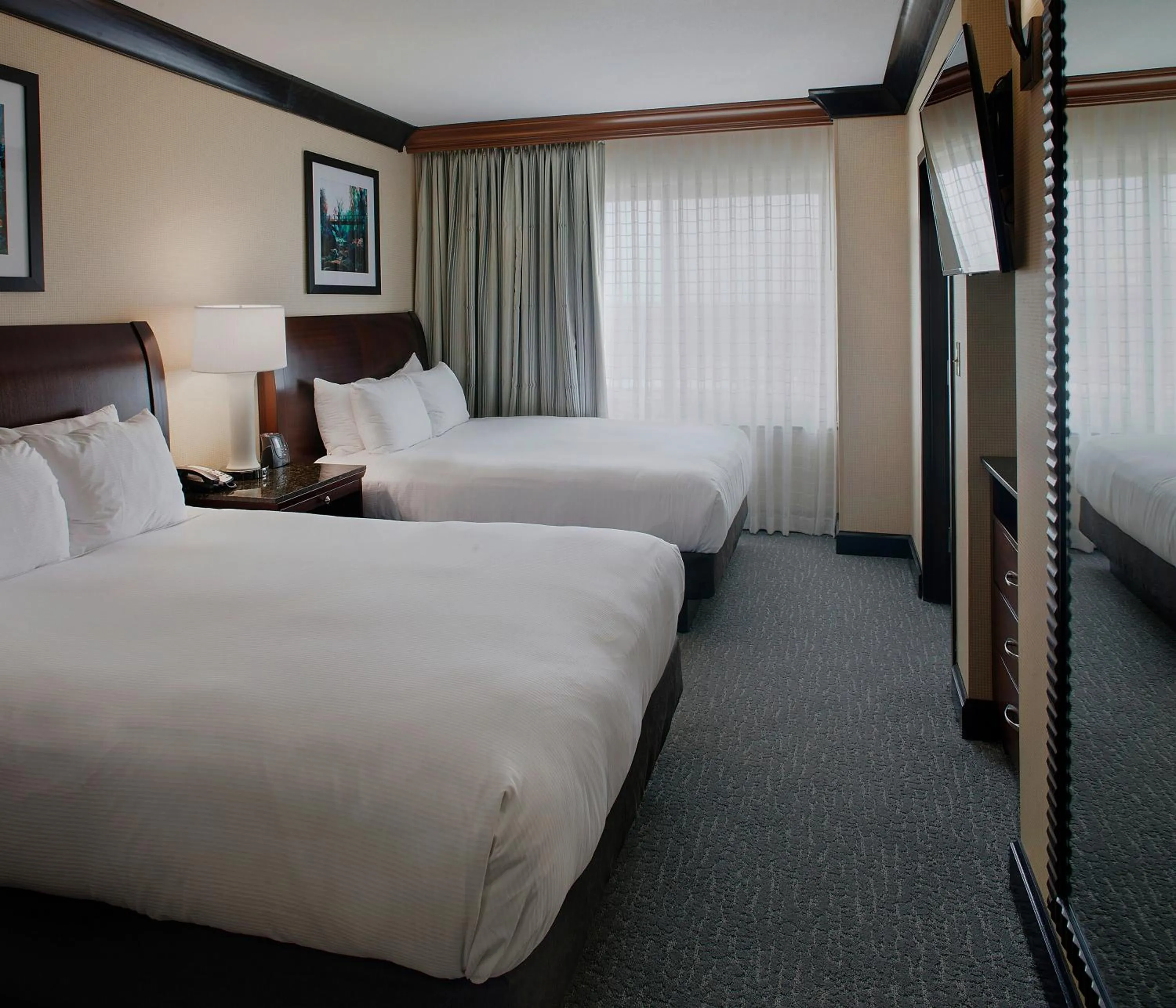 Bed in DoubleTree Suites by Hilton Bentonville